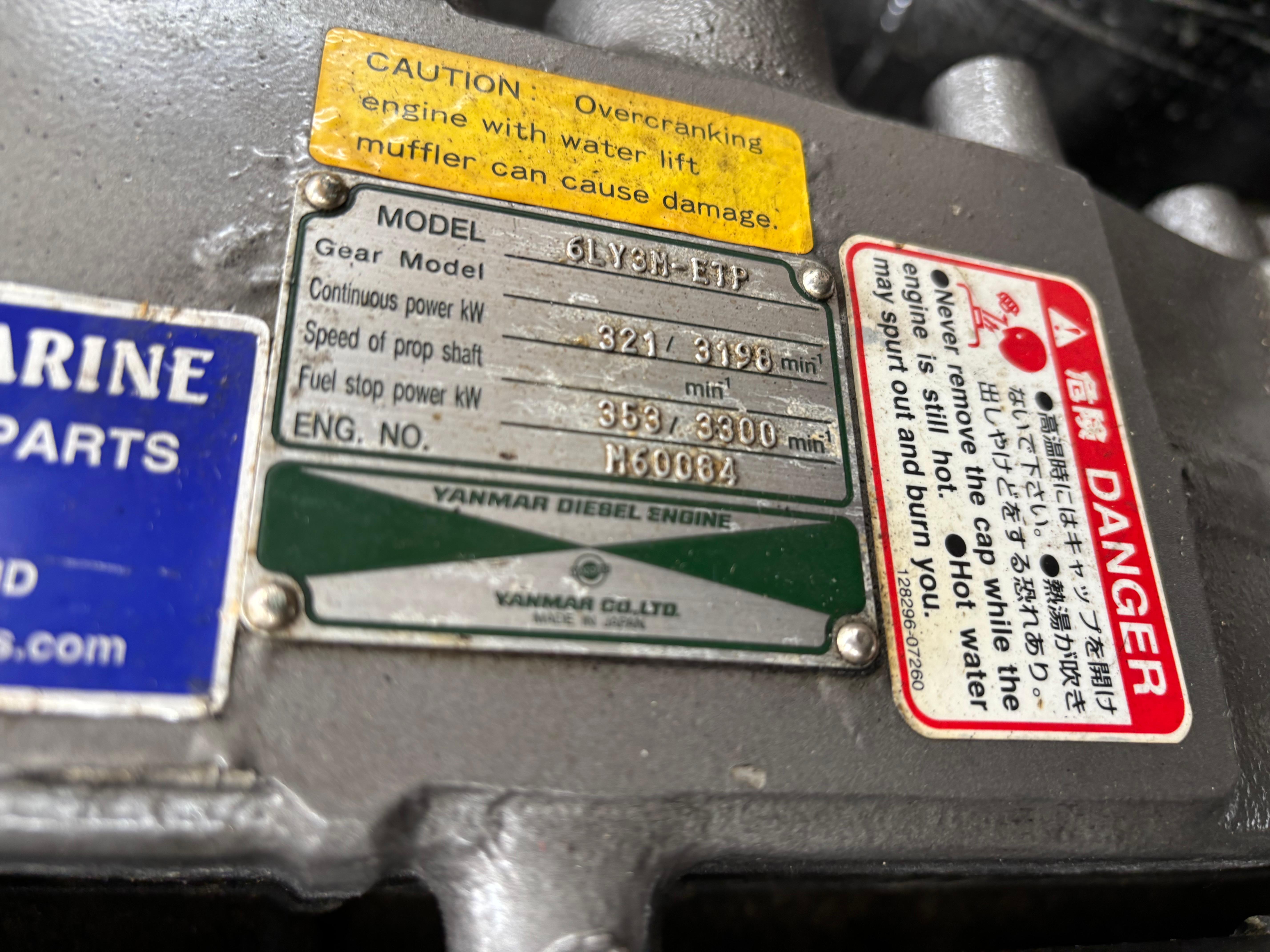MJM-34z Express HT 2006-Zest MD-US-Yanmar diesel engine plate with caution and danger labels on MJM 34z Express HT, 2006 model.-9817750 | Thumbnail