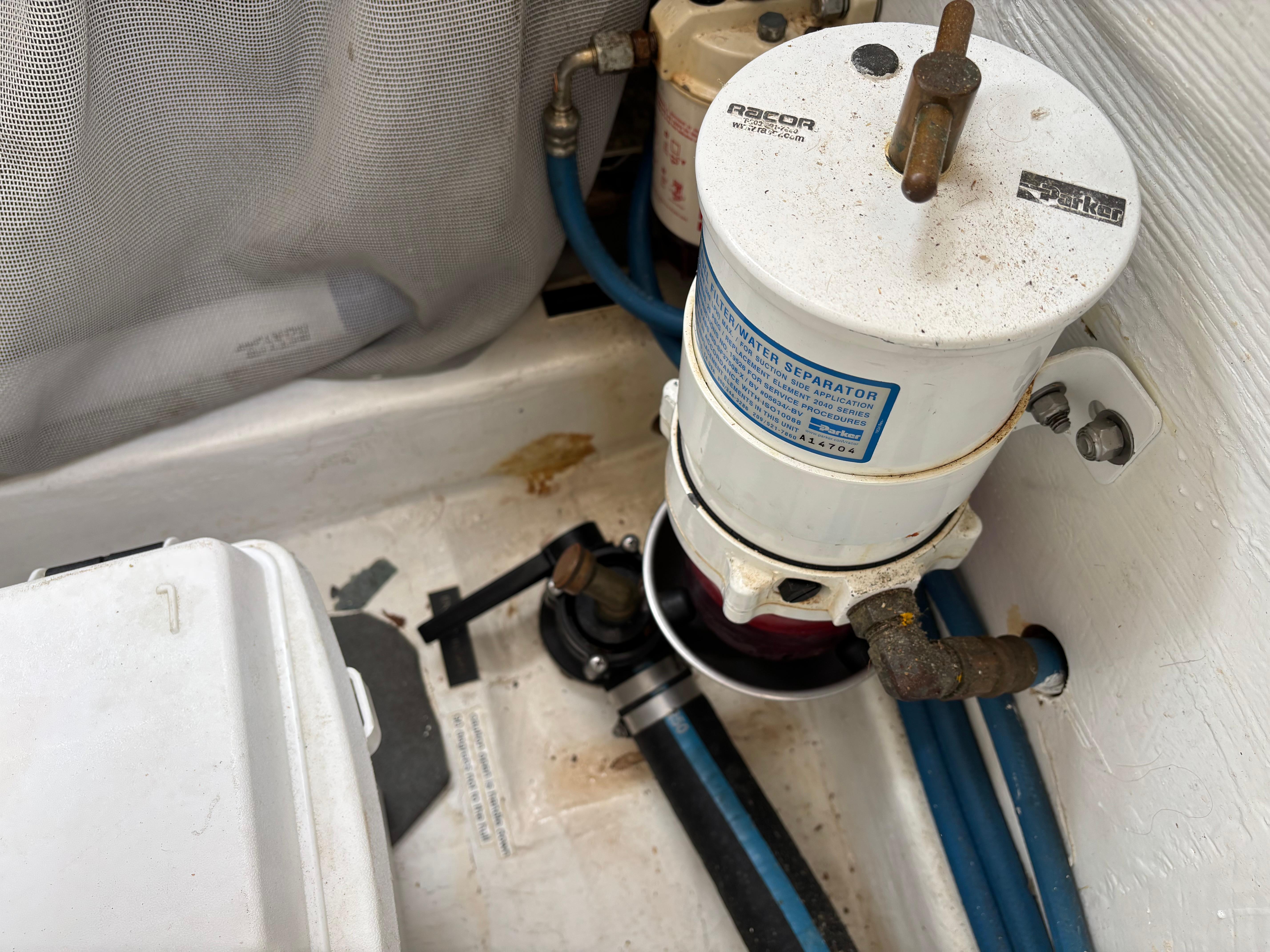 MJM-34z Express HT 2006-Zest MD-US-Fuel filter system in 2006 MJM 34z Express HT boat engine compartment.-9817750 | Thumbnail