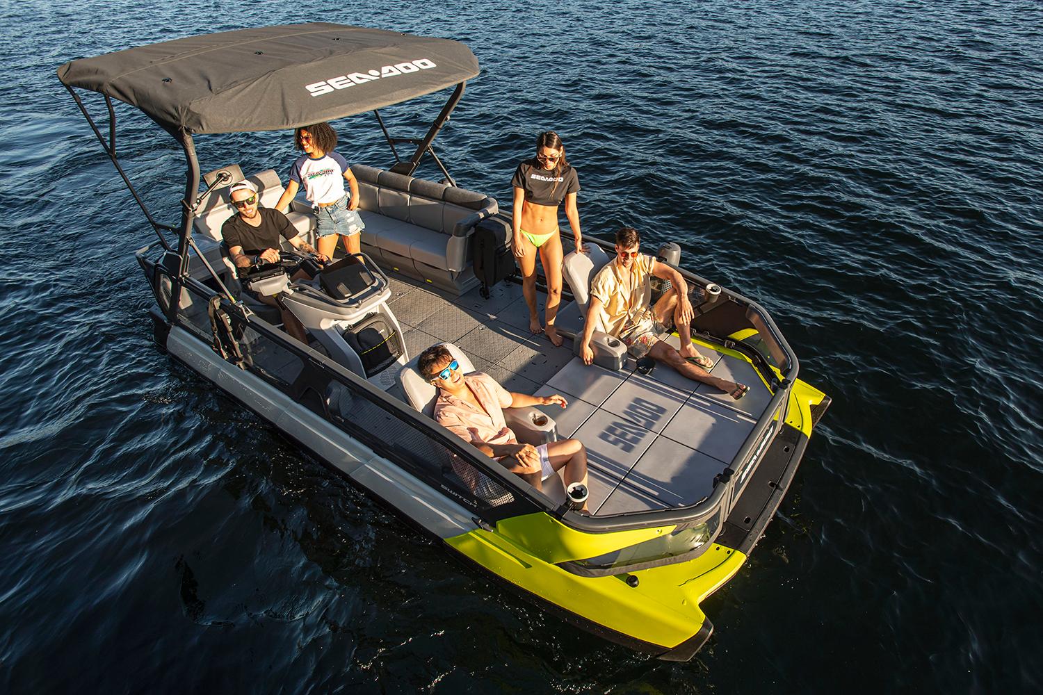 Manufacturer Provided Image: 2022 Sea-Doo Switch Sport 21 pontoon boat with people enjoying on the water.