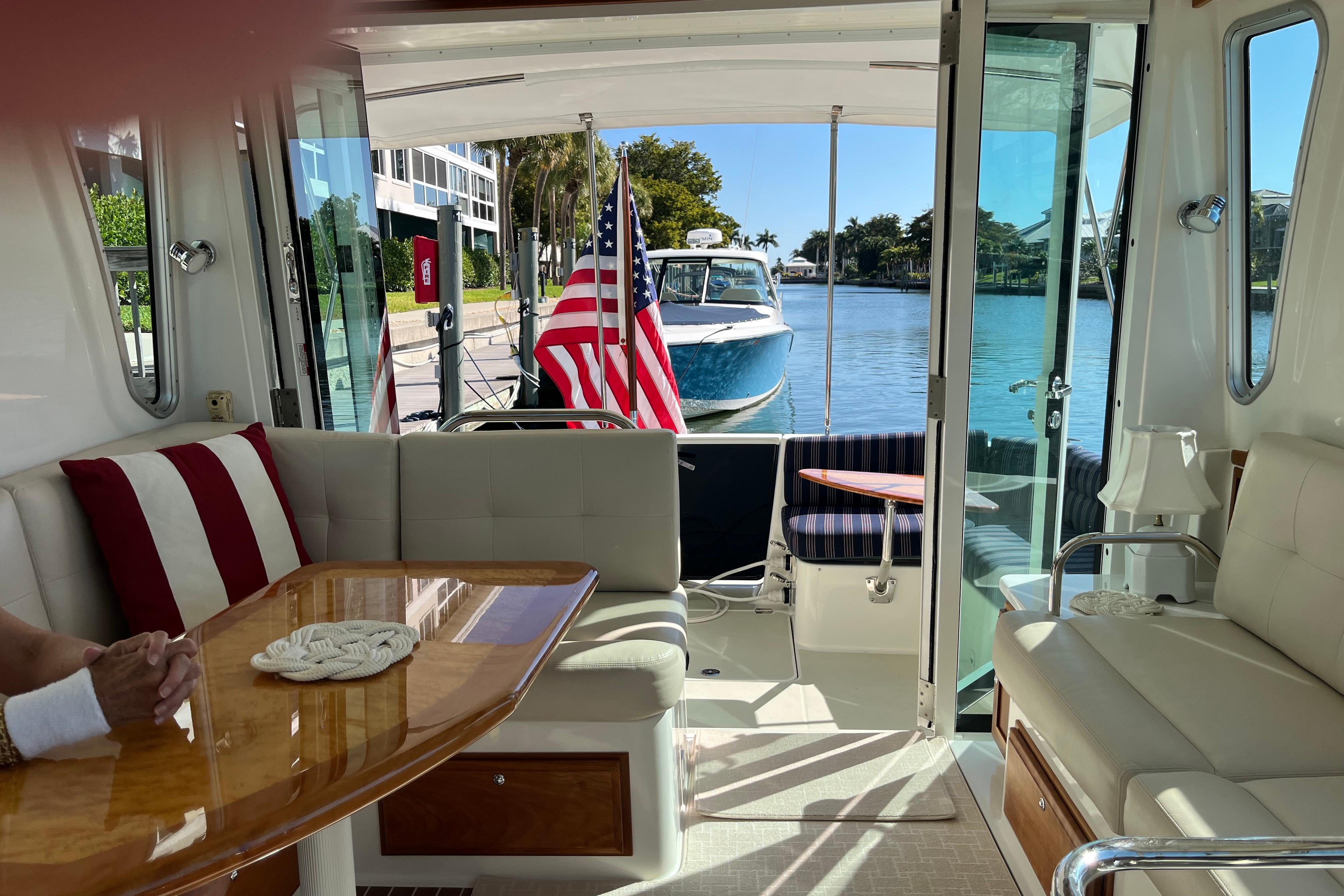 Interior of a 2017 Back Cove 37 yacht with elegant seating and waterfront view.