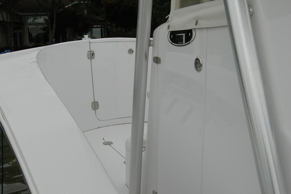 2013 Composite Yacht 26, sleek white deck and cabin details, showcasing modern design.