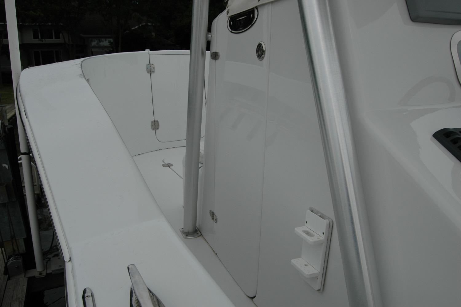 2013 Composite Yacht 26, sleek white deck and railing detail.