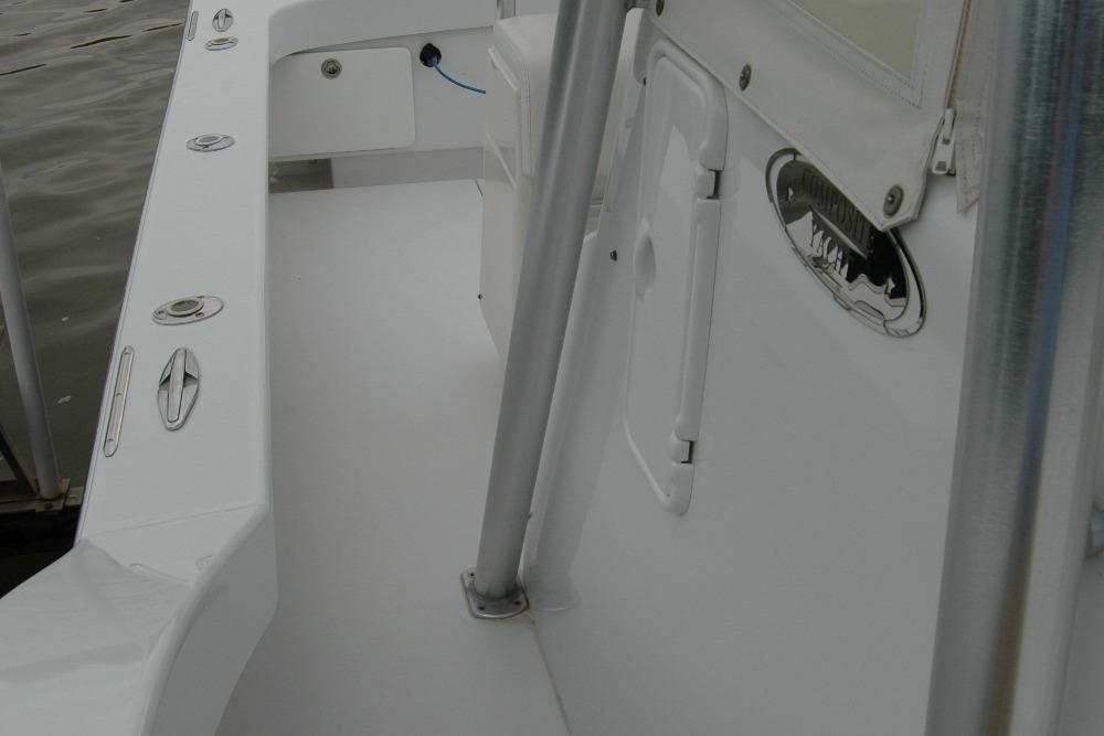 2013 Composite Yacht 26 deck view with sleek design and stainless steel fittings.