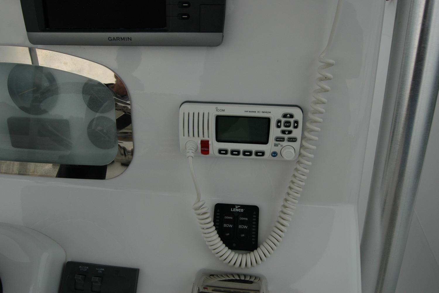 Control panel of a 2013 Composite Yacht 26 with Garmin and Icom devices.