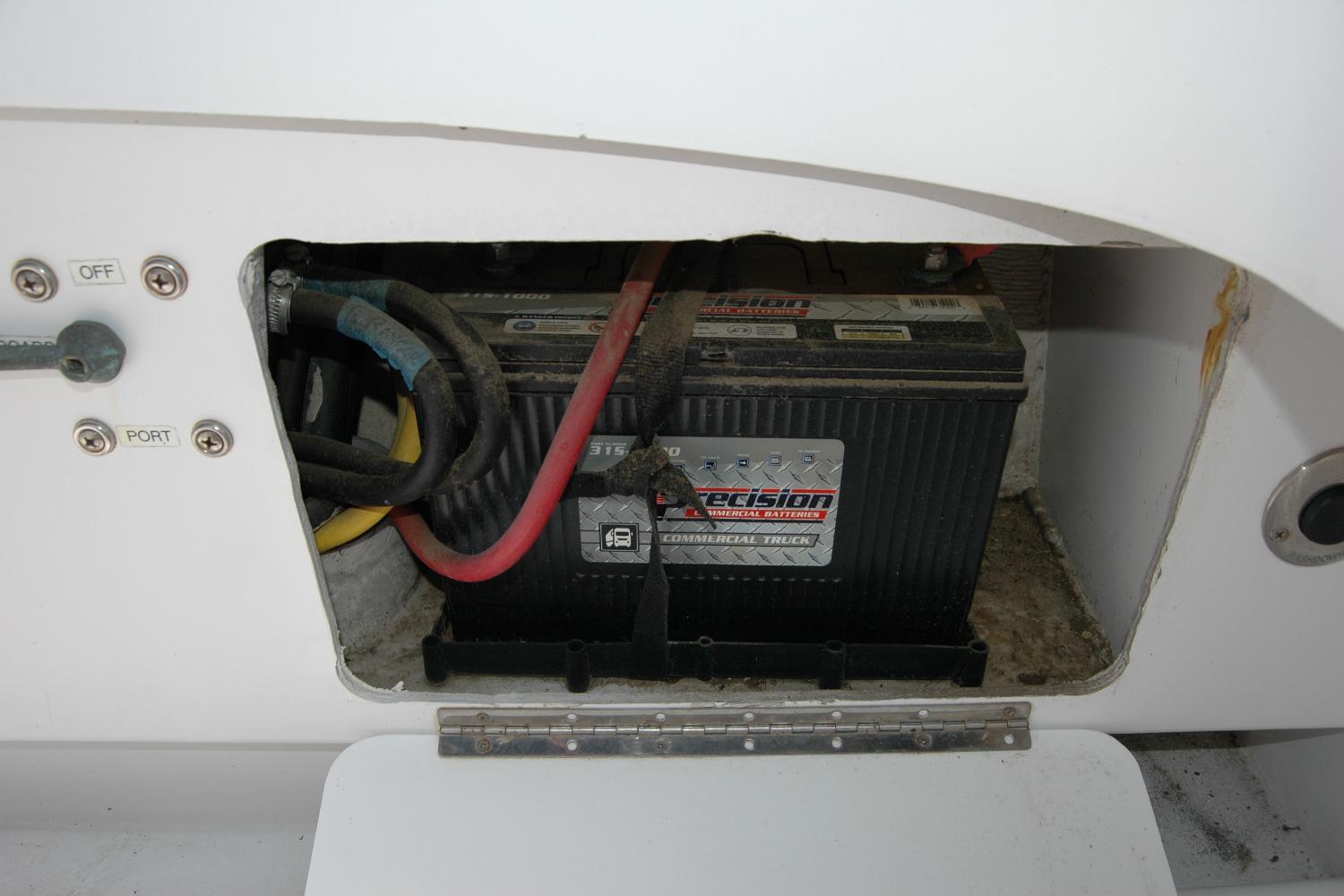 Battery compartment of a 2013 Composite Yacht 26, featuring a Precision commercial battery.