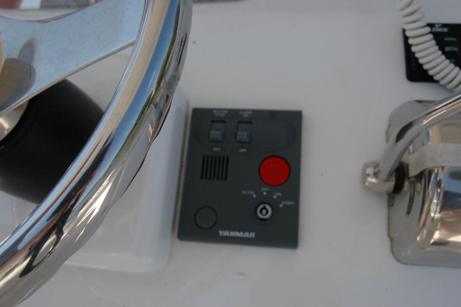 Steering wheel and control panel of 2013 Composite Yacht 26 with Yanmar system.