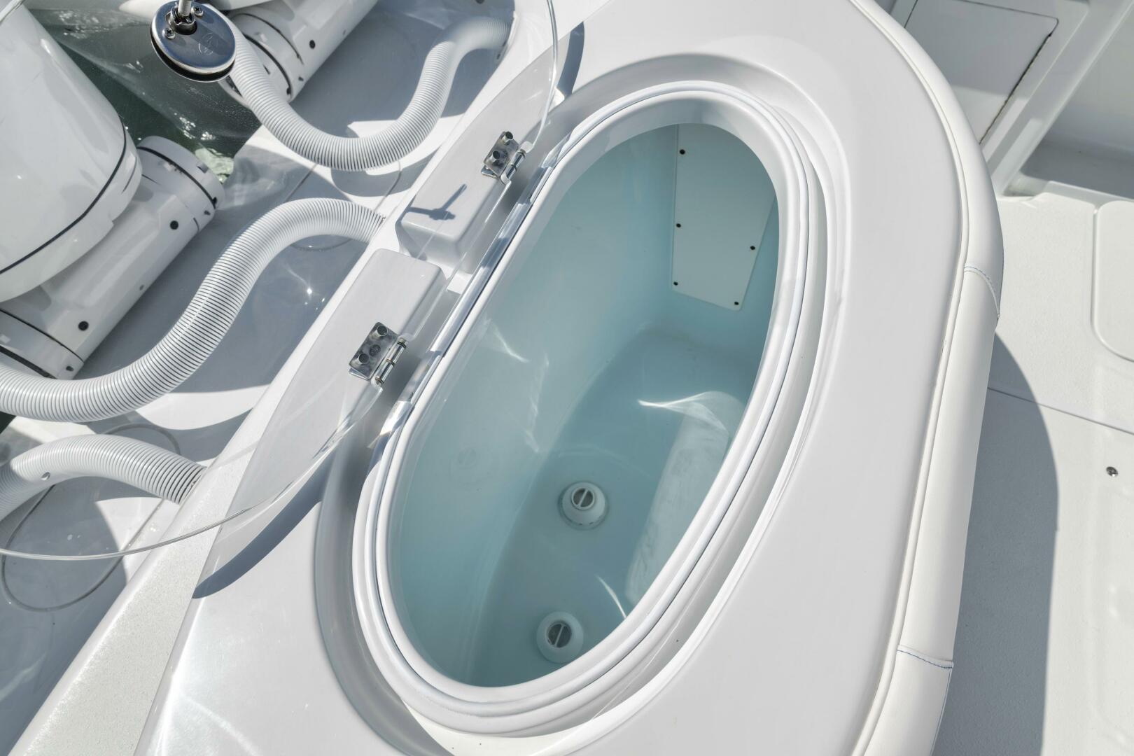 Yellowfin-36 Offshore 2025-36 Offshore FL-US-2025 Yellowfin 36 Offshore boat livewell, featuring a sleek, oval design and white finish.-9817861 | Thumbnail