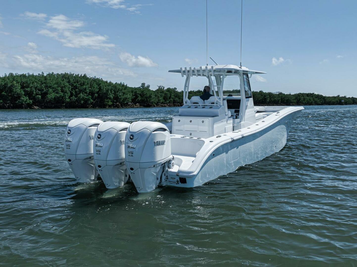 Yellowfin-36 Offshore 2025-36 Offshore FL-US-2025 Yellowfin 36 Offshore boat with triple Yamaha engines on the water.-9817861 | Thumbnail