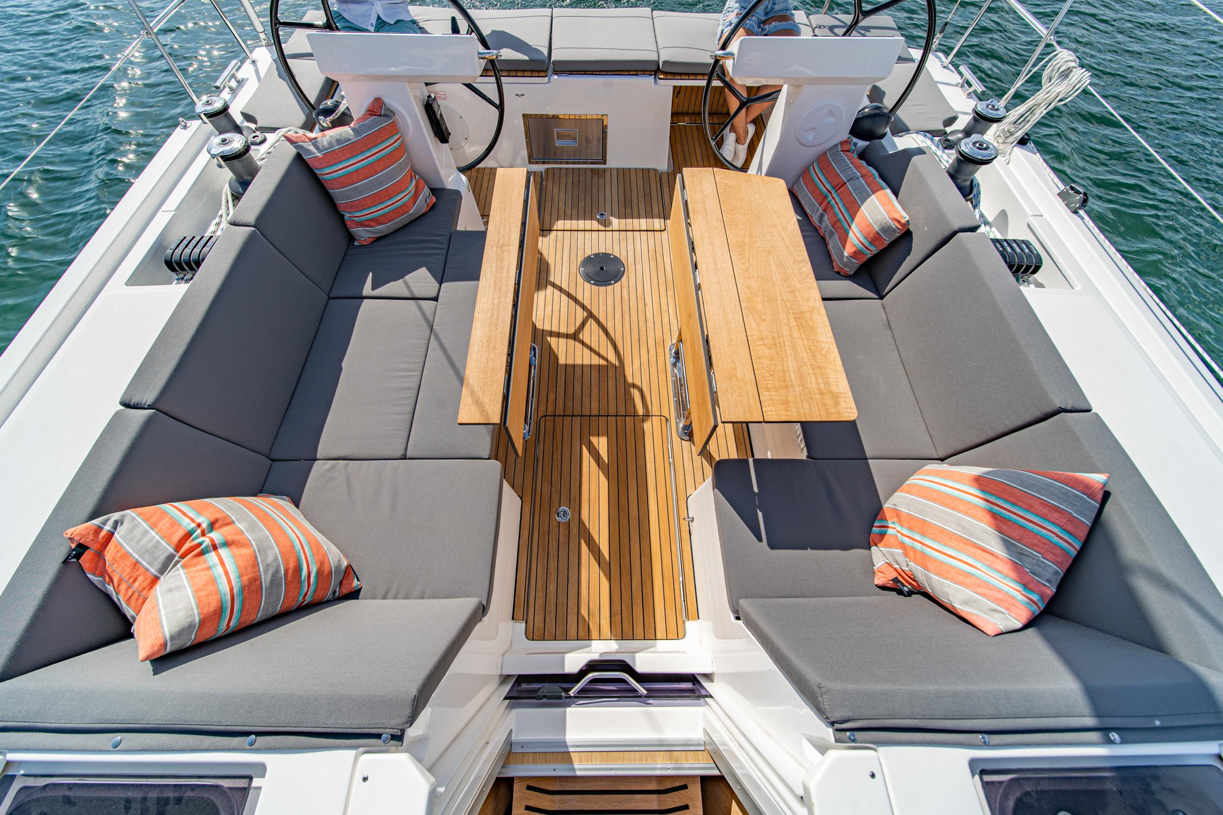 Bavaria-C45 2024-In stock and availabe now CA-US-2024 Bavaria C45 yacht cockpit with cushioned seating and striped pillows.-9712200 | Thumbnail