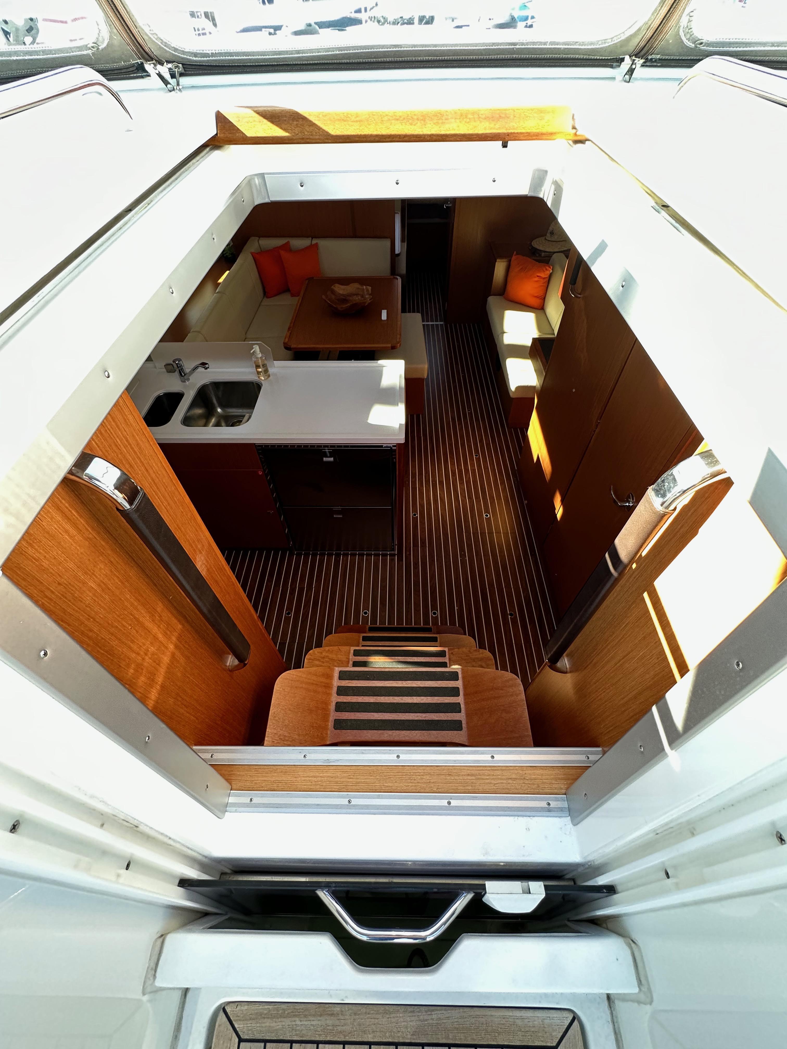 Bavaria-C45 2024-In stock and availabe now CA-US-Interior view of 2024 Bavaria C45 yacht, featuring modern kitchen and seating area.-9712200 | Thumbnail