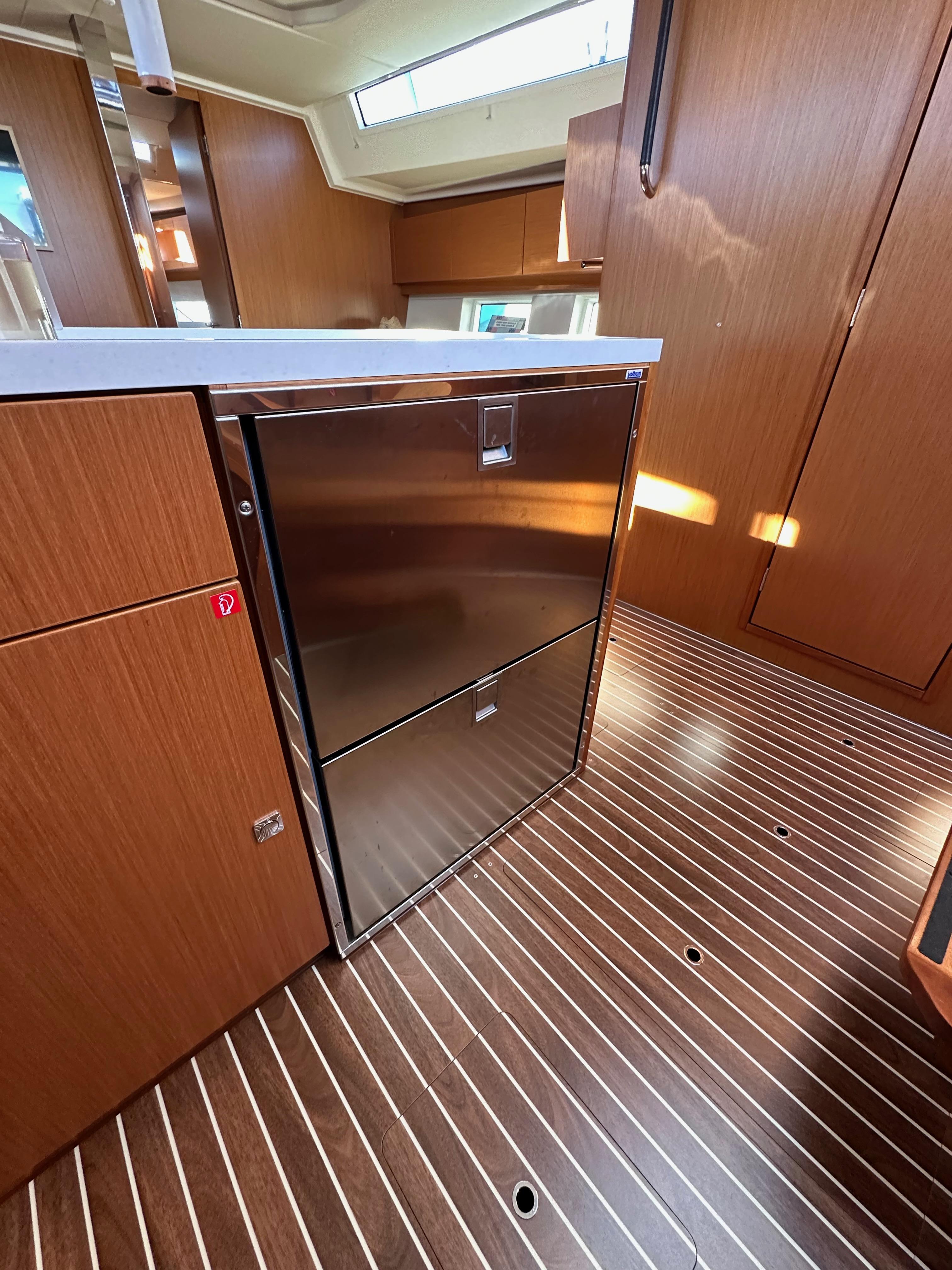 Bavaria-C45 2024-In stock and availabe now CA-US-2024 Bavaria C45 yacht interior with modern kitchen cabinetry and sleek wood flooring.-9712200 | Thumbnail