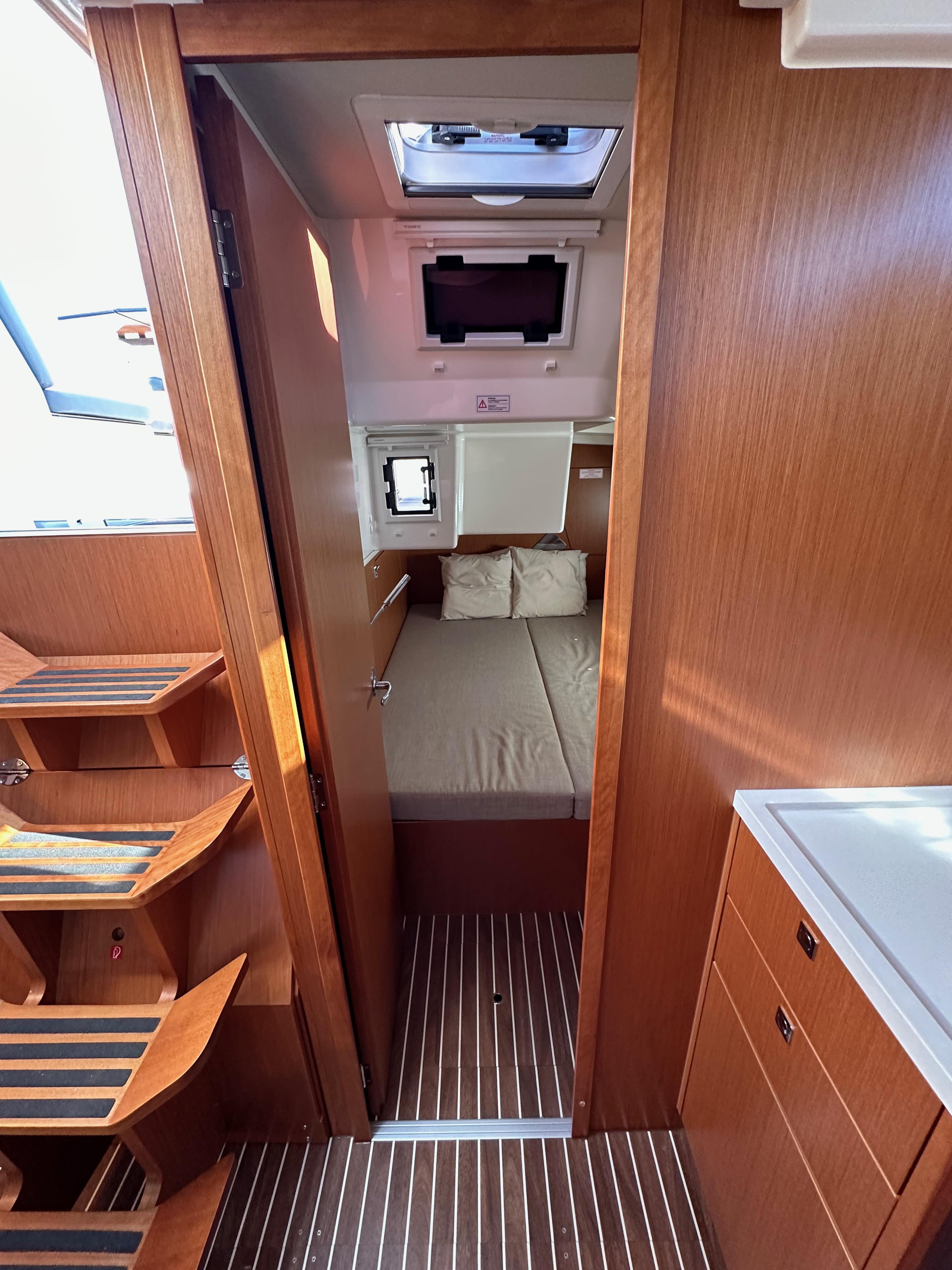 Bavaria-C45 2024-In stock and availabe now CA-US-Interior of 2024 Bavaria C45 yacht, featuring a cozy cabin with wooden finishes.-9712200 | Thumbnail