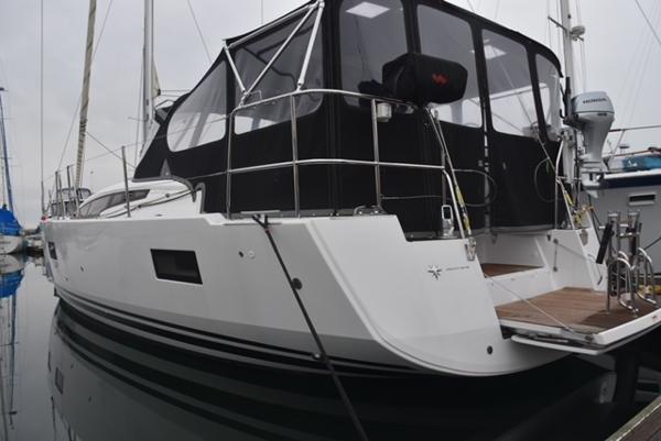 2016 Jeanneau 54 yacht docked, featuring sleek design and modern amenities.