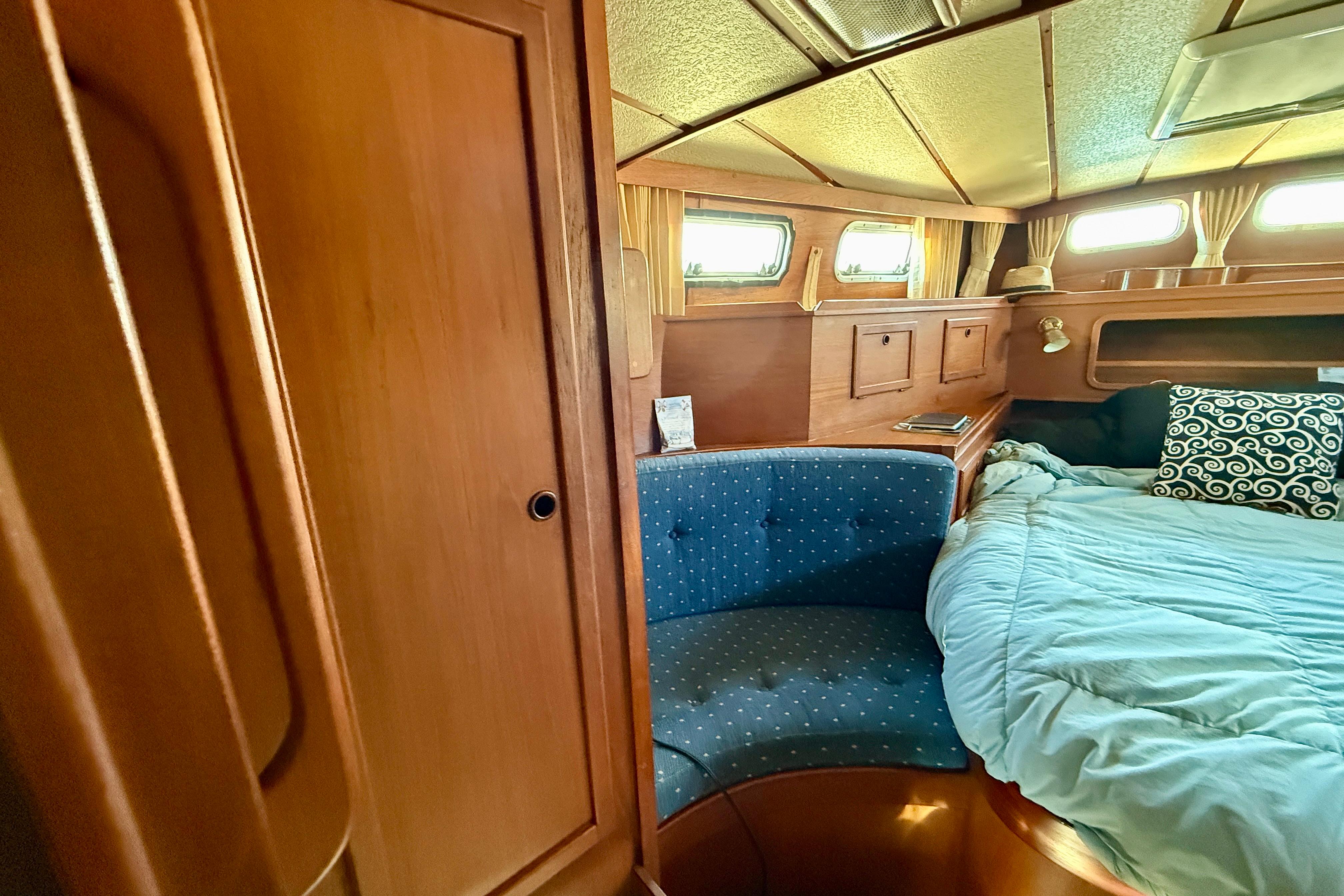 Cozy owners stateroom cabin seating.
