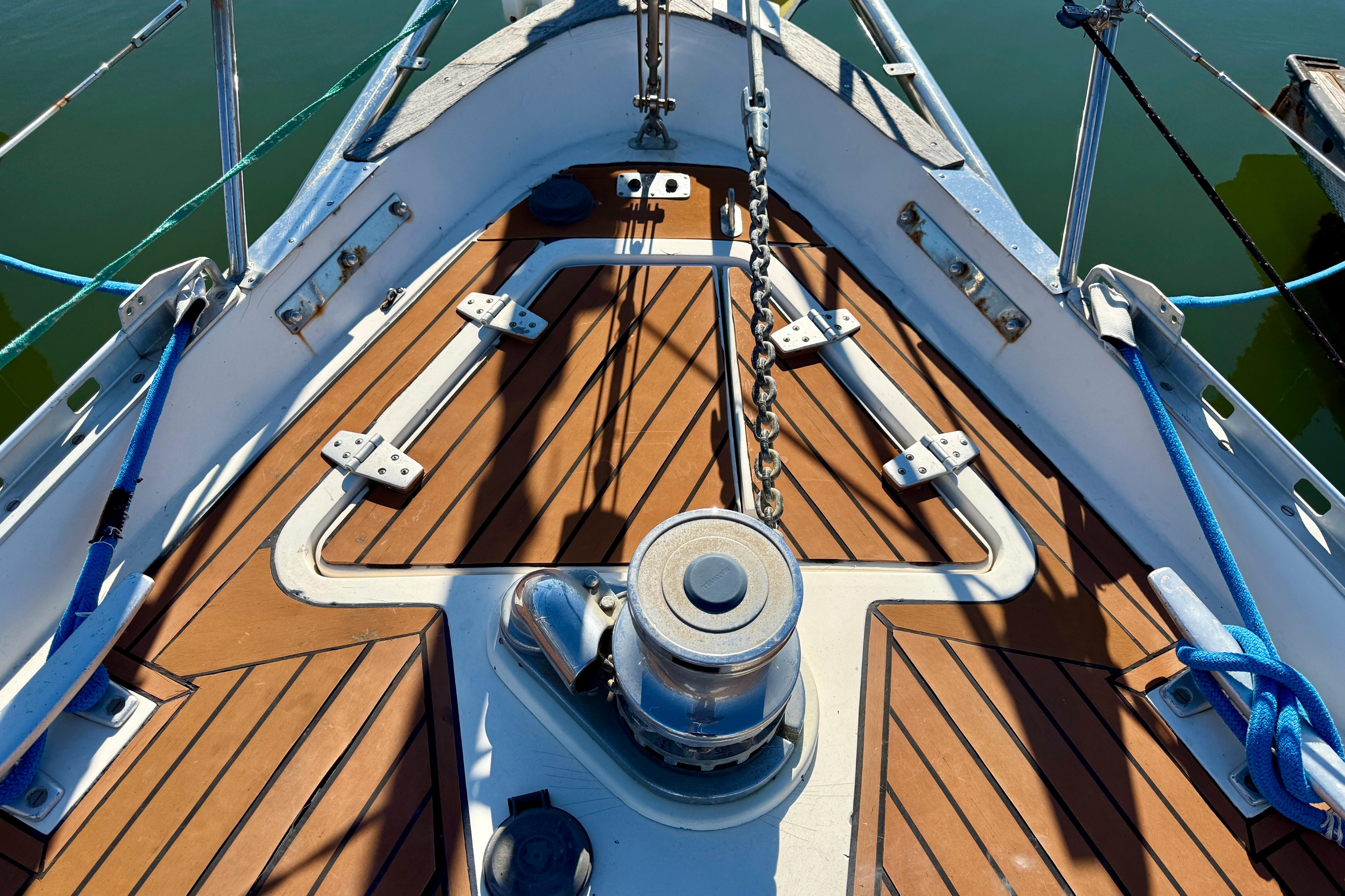 Deck of 1986 Nauticat 43 sailboat with anchor chain and FlexiTeak composite decking