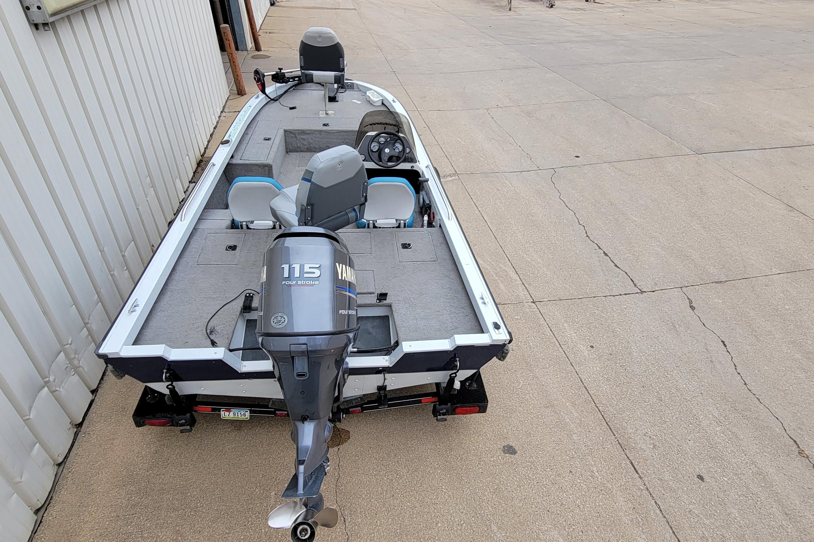 1999 Ranger 107 Cherokee boat with Yamaha 115 engine on a trailer.