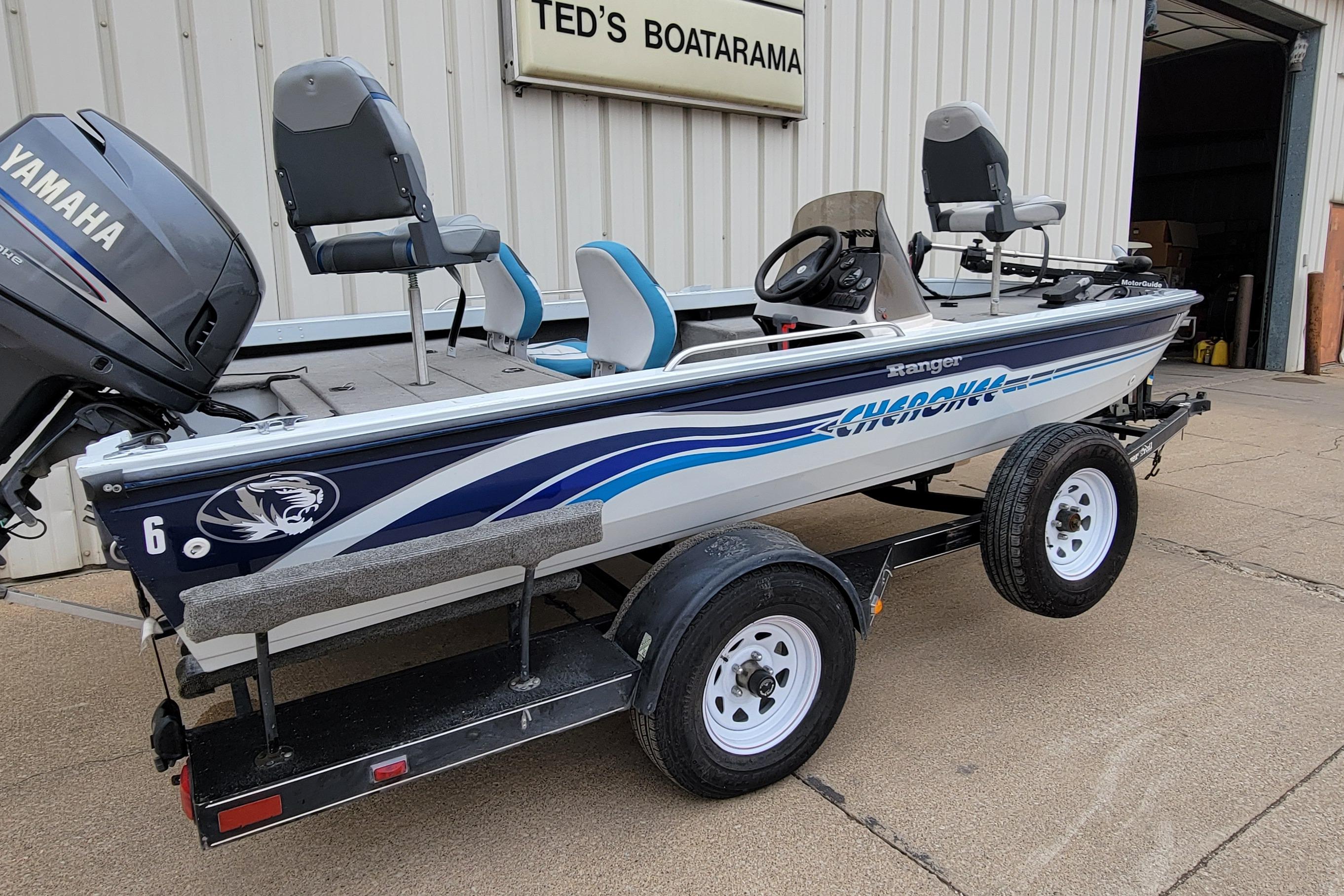 1999 Ranger 107 Cherokee boat with Yamaha motor on trailer at Ted's Boatarama.