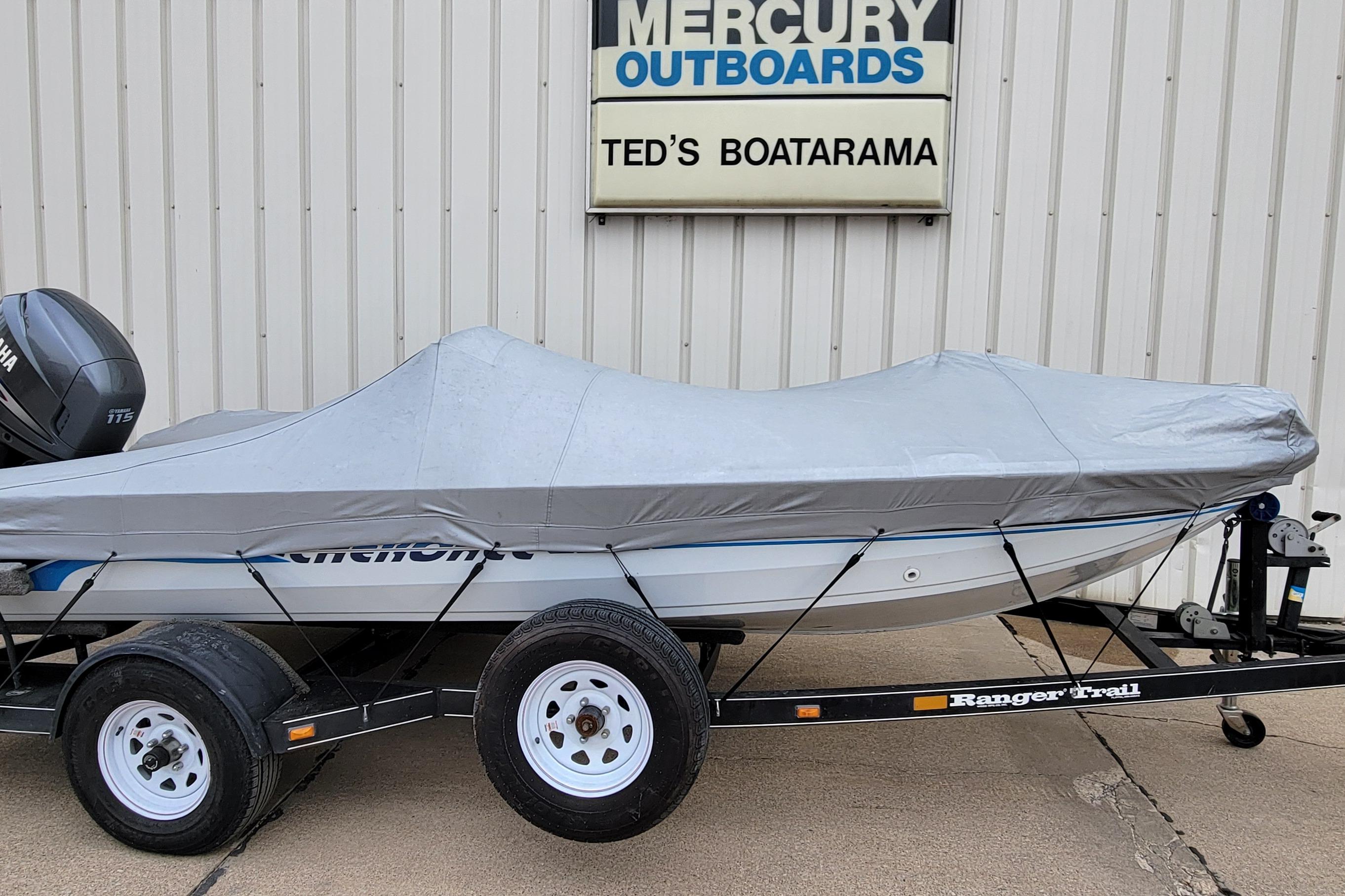 1999 Ranger 107 Cherokee boat covered on trailer at Ted's Boatarama.
