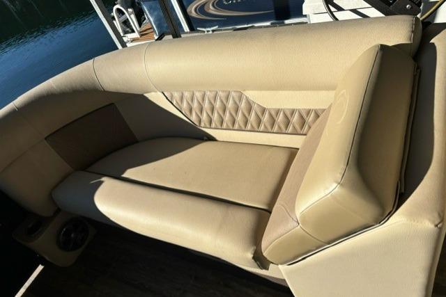 2019 Crest 220 CREST II boat interior with beige seating and quilted design.