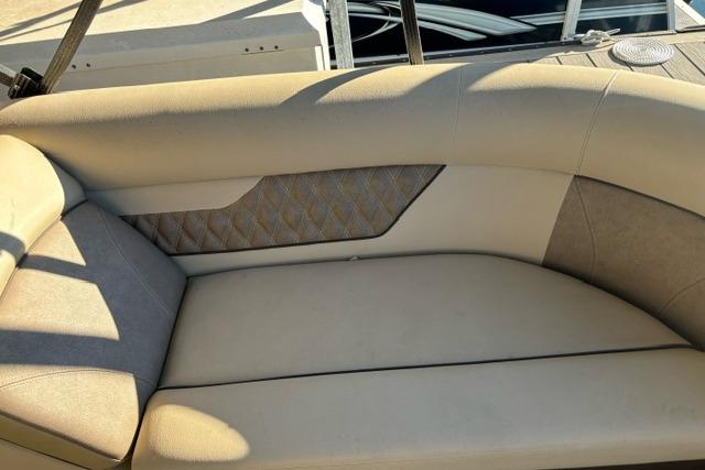 2019 Crest 220 CREST II boat interior seating with beige upholstery and quilted design.
