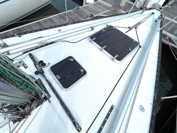 Deck of 1980 Davidson 44 sailboat with hatches and rigging.