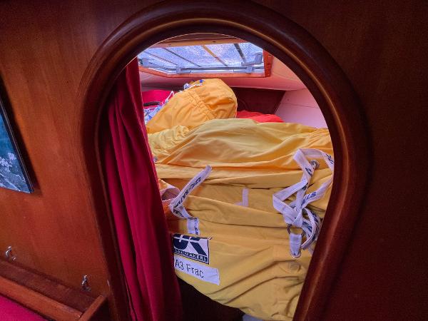 Yellow sail stored in cabin of 1980 Davidson 44 yacht.