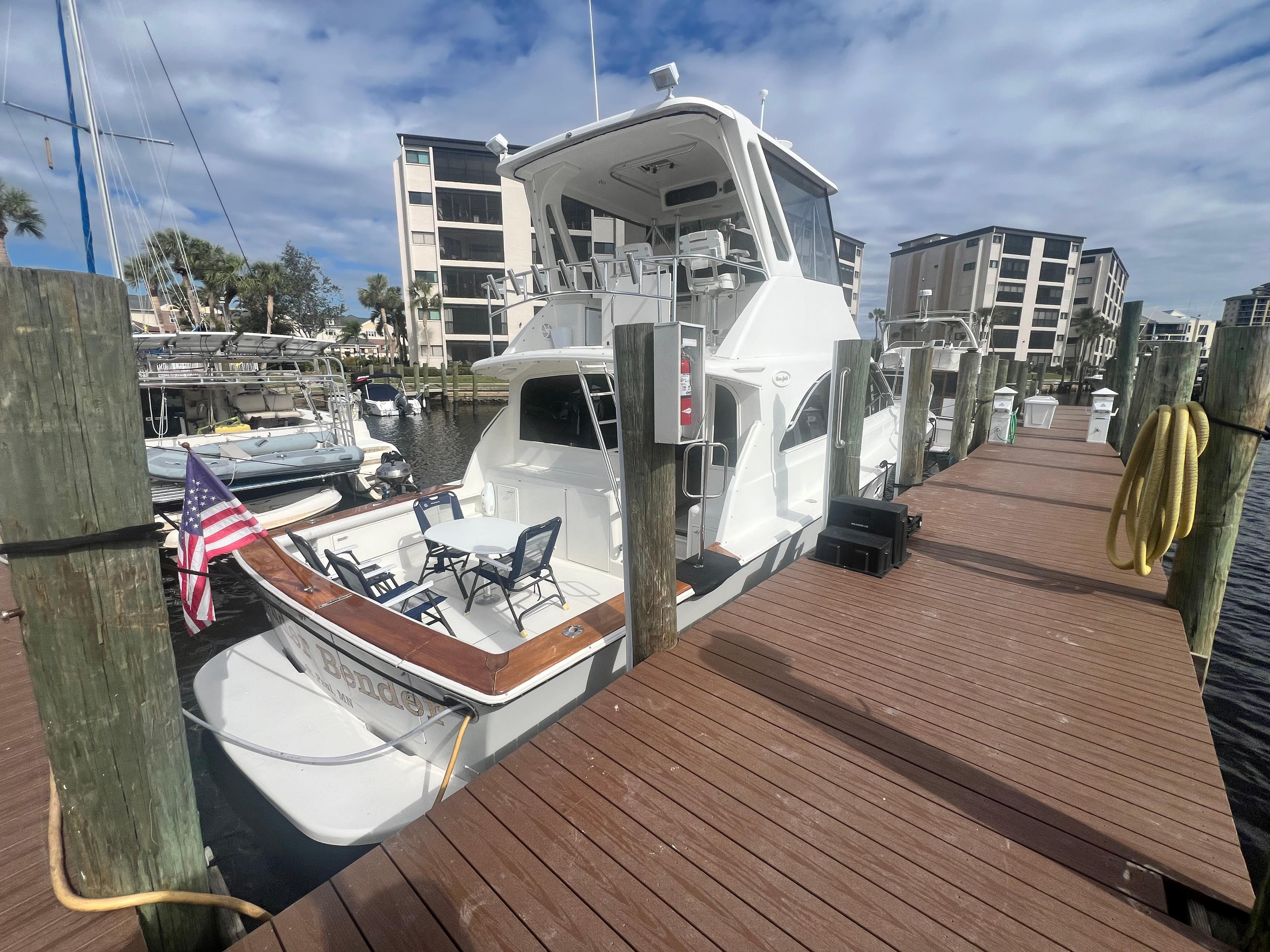 Ocean Yachts-48 Super Sport 1996-Fender Bender FL-US-Ocean Yachts 1996 48 Super Sport docked at marina with American flag.-9657986 | Thumbnail