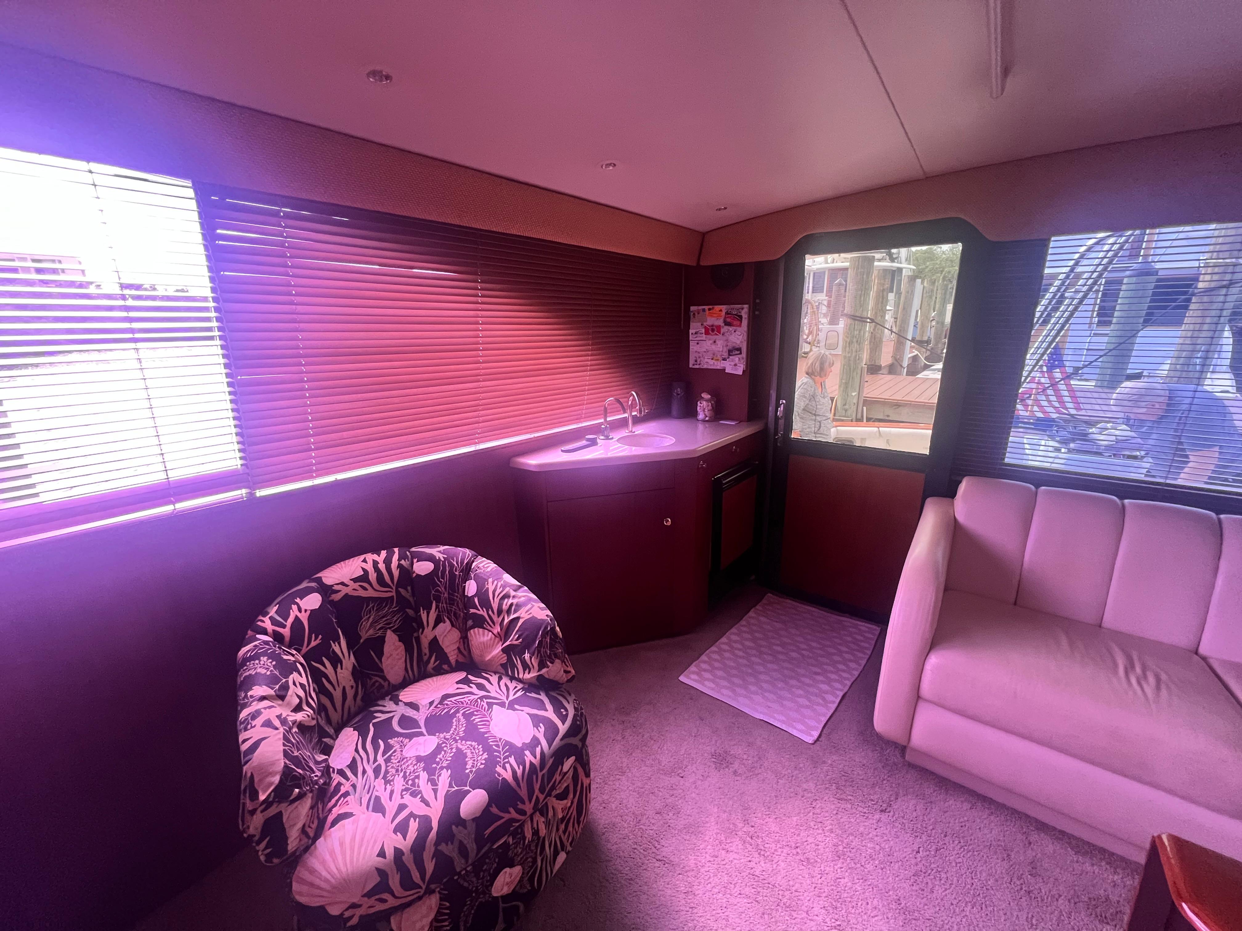 Ocean Yachts-48 Super Sport 1996-Fender Bender FL-US-Interior of 1996 Ocean Yachts 48 Super Sport with plush seating and floral chair.-9657986 | Thumbnail