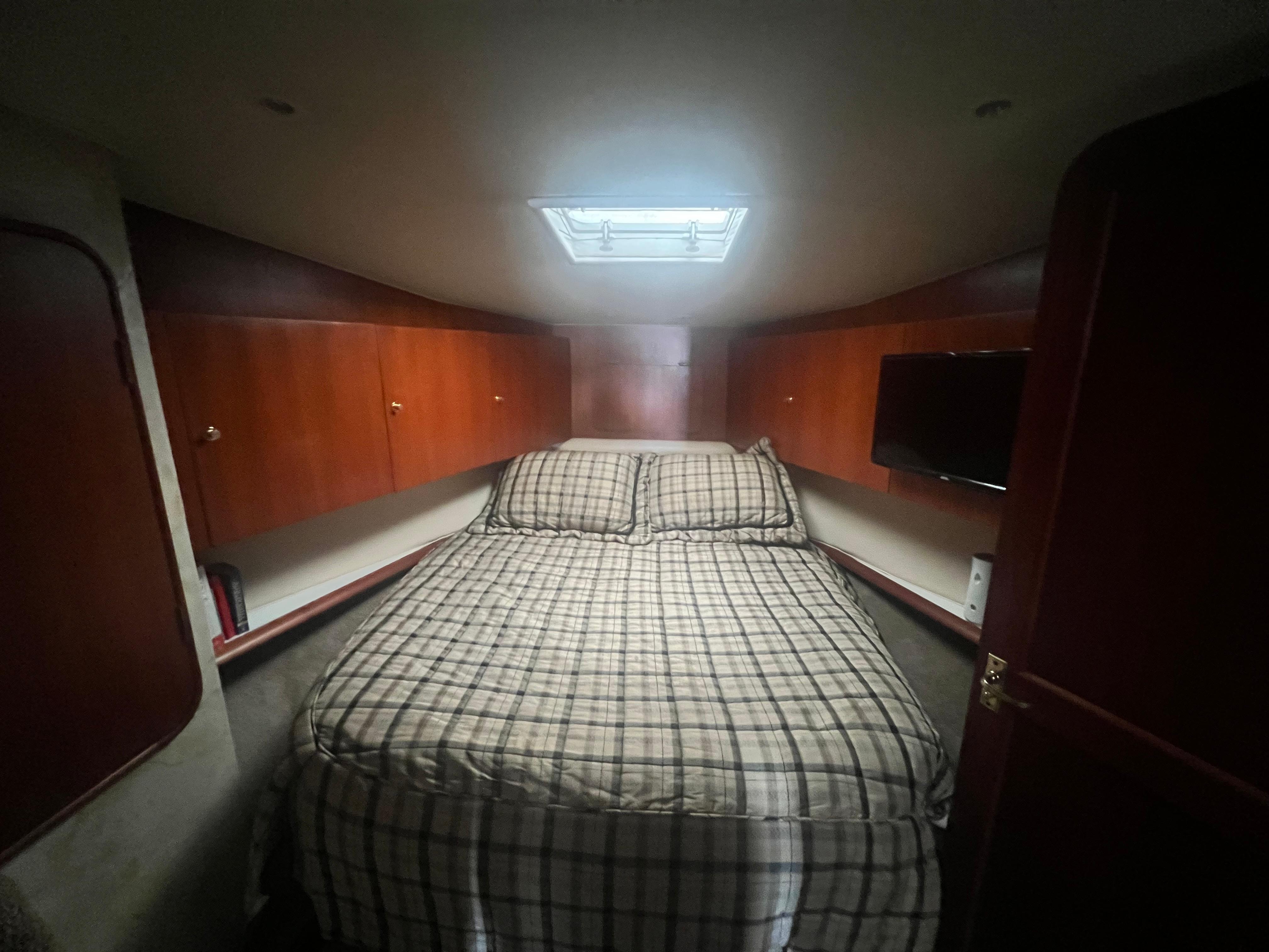 Ocean Yachts-48 Super Sport 1996-Fender Bender FL-US-Interior cabin of 1996 Ocean Yachts 48 Super Sport with bed and wooden cabinets.-9657986 | Thumbnail