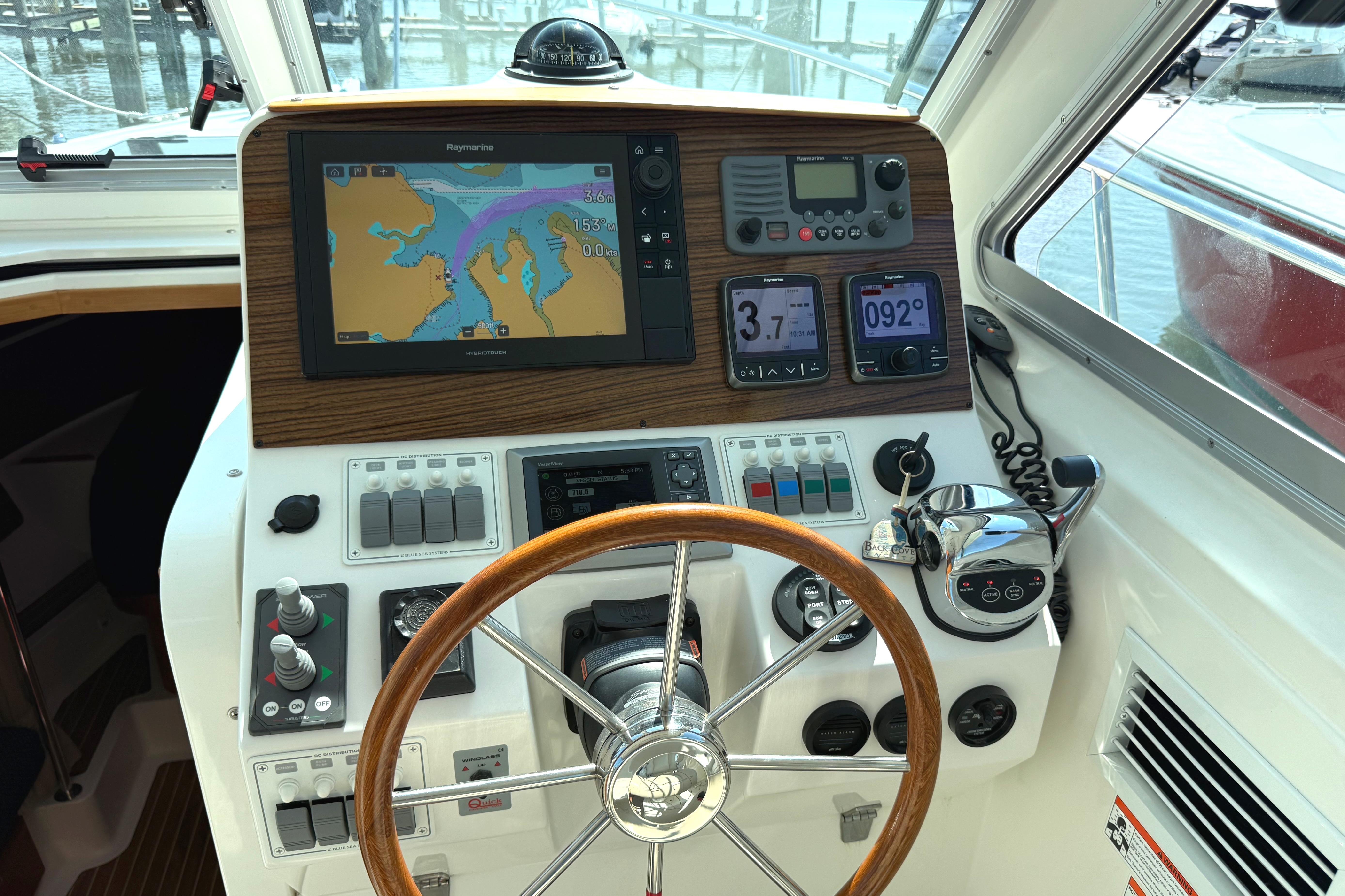 Helm of 2013 Back Cove 34 boat with navigation and control systems.