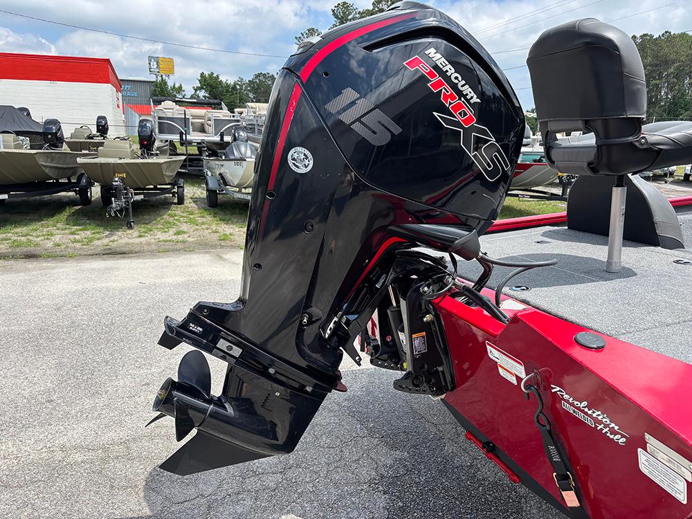 2024 Tracker Pro Team 190 TX boat with Mercury Pro XS engine, parked outdoors.