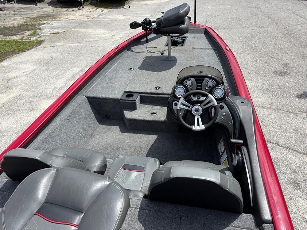 2024 Tracker Pro Team 190 TX boat interior with steering wheel and seating.