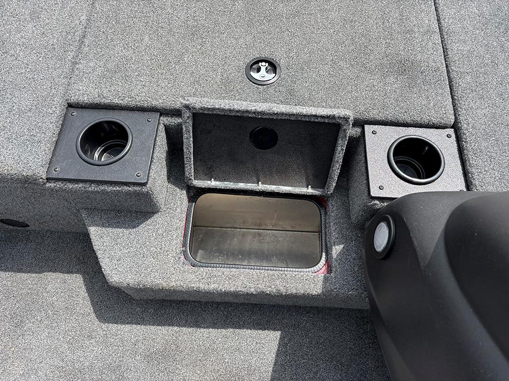 2024 Tracker Pro Team 190 TX boat interior with storage compartments and cup holders.