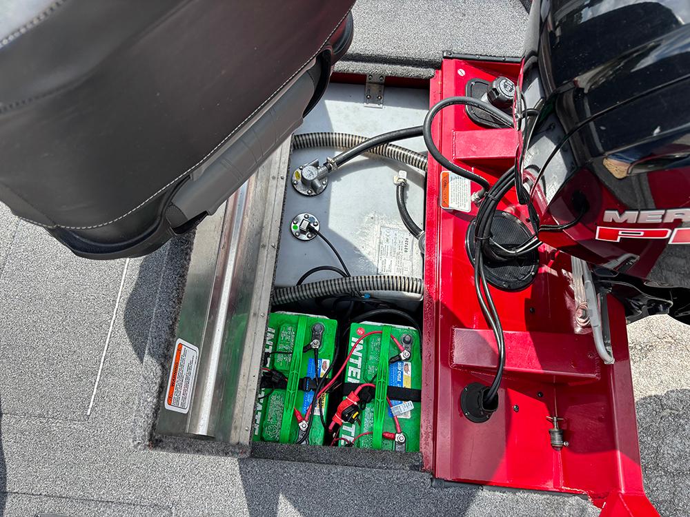 2024 Tracker Pro Team 190 TX boat battery compartment with wiring and engine components.