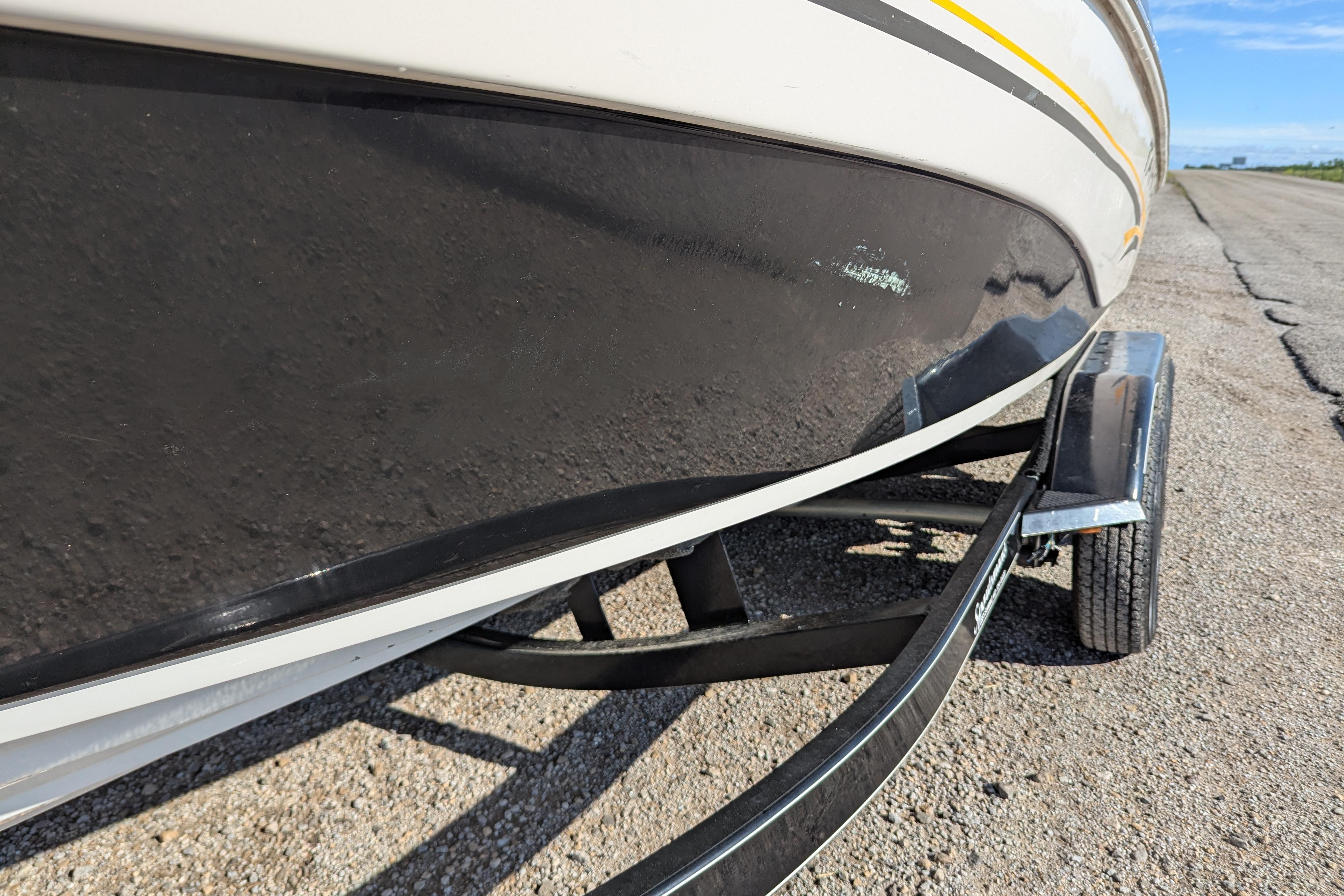 2006 Tahoe Q6 Sport boat on trailer, close-up view.