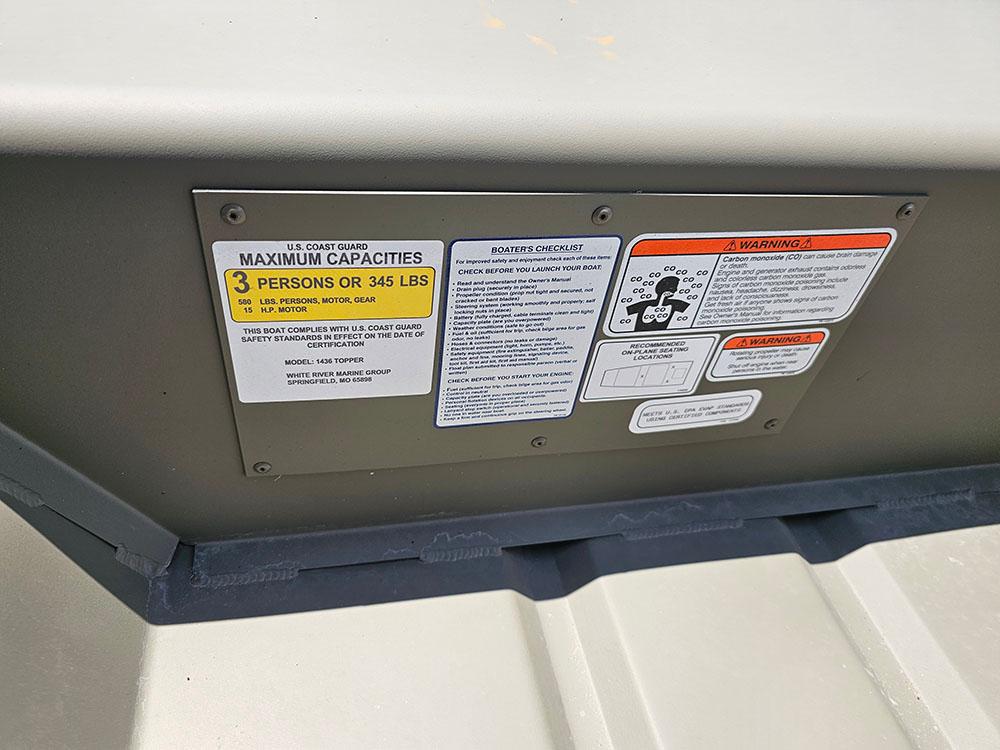 2025 Tracker Grizzly 14 Jon boat capacity and safety warning labels.