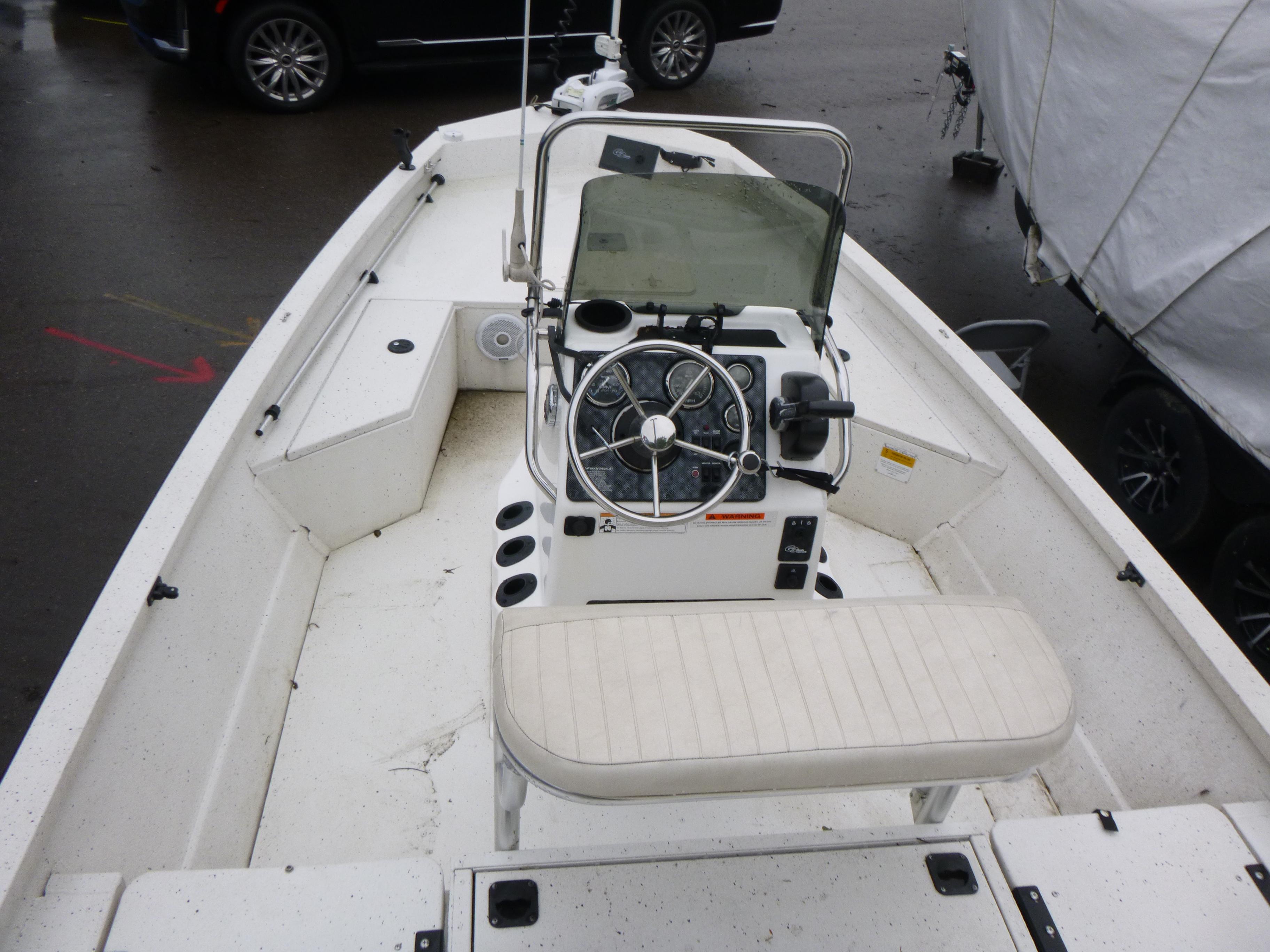 2017 G3 Bay 18 DLX boat interior with steering console and seating.