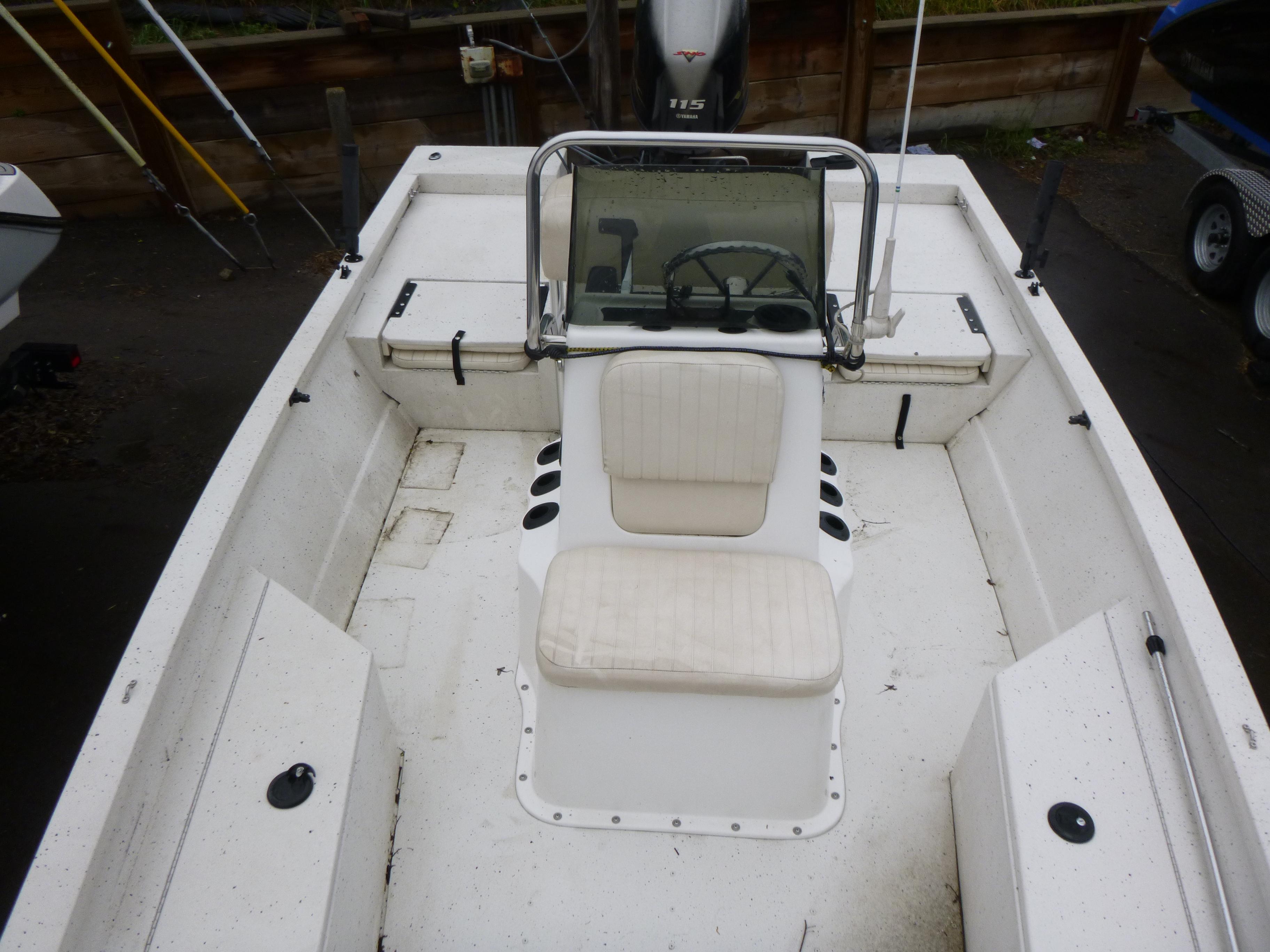 2017 G3 Bay 18 DLX boat interior with seating and steering console.
