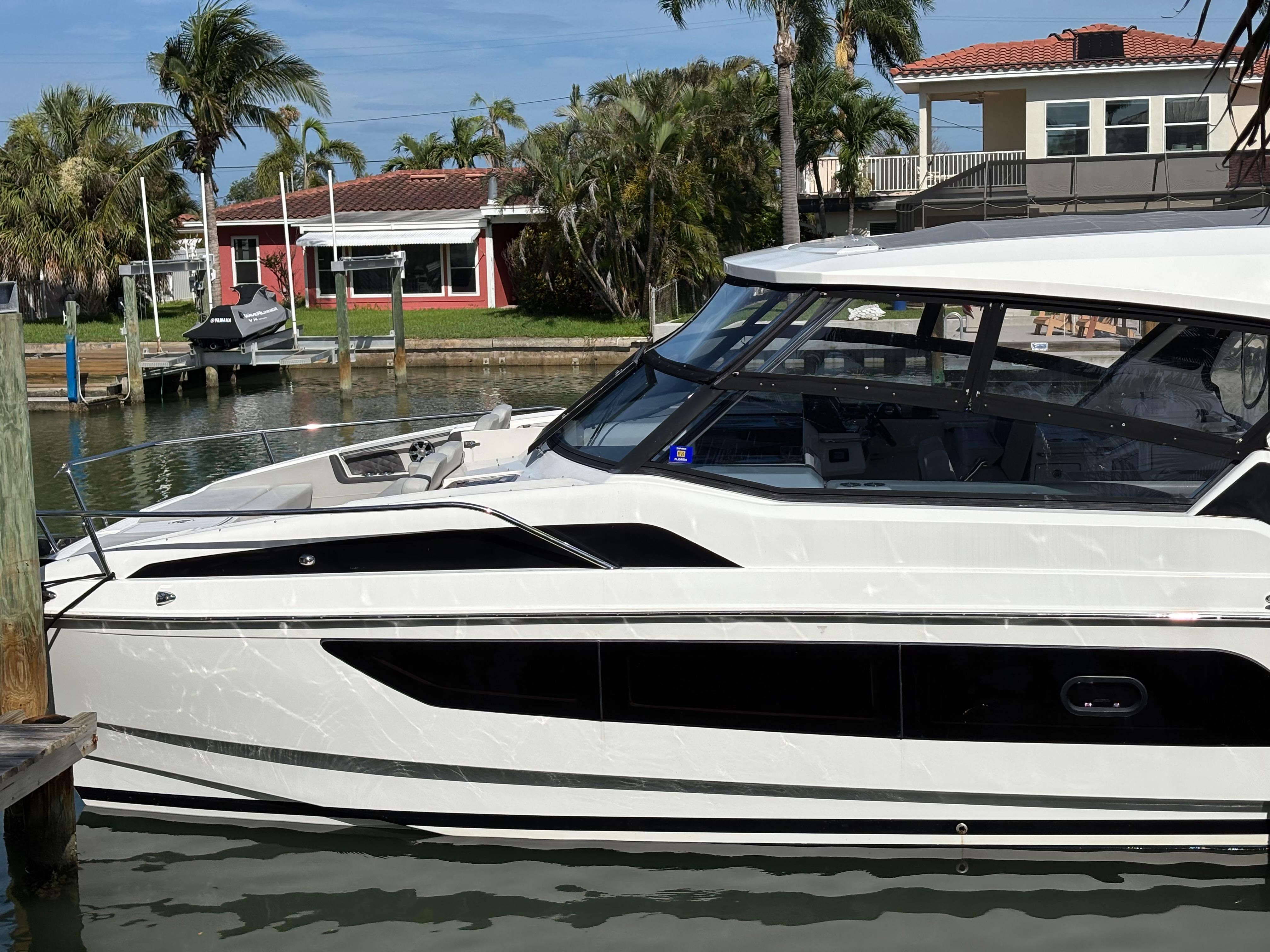 Aquila-36 Sport 2018-Namaste FL-US-2018 Aquila 36 Sport yacht docked near waterfront homes.-9848040
