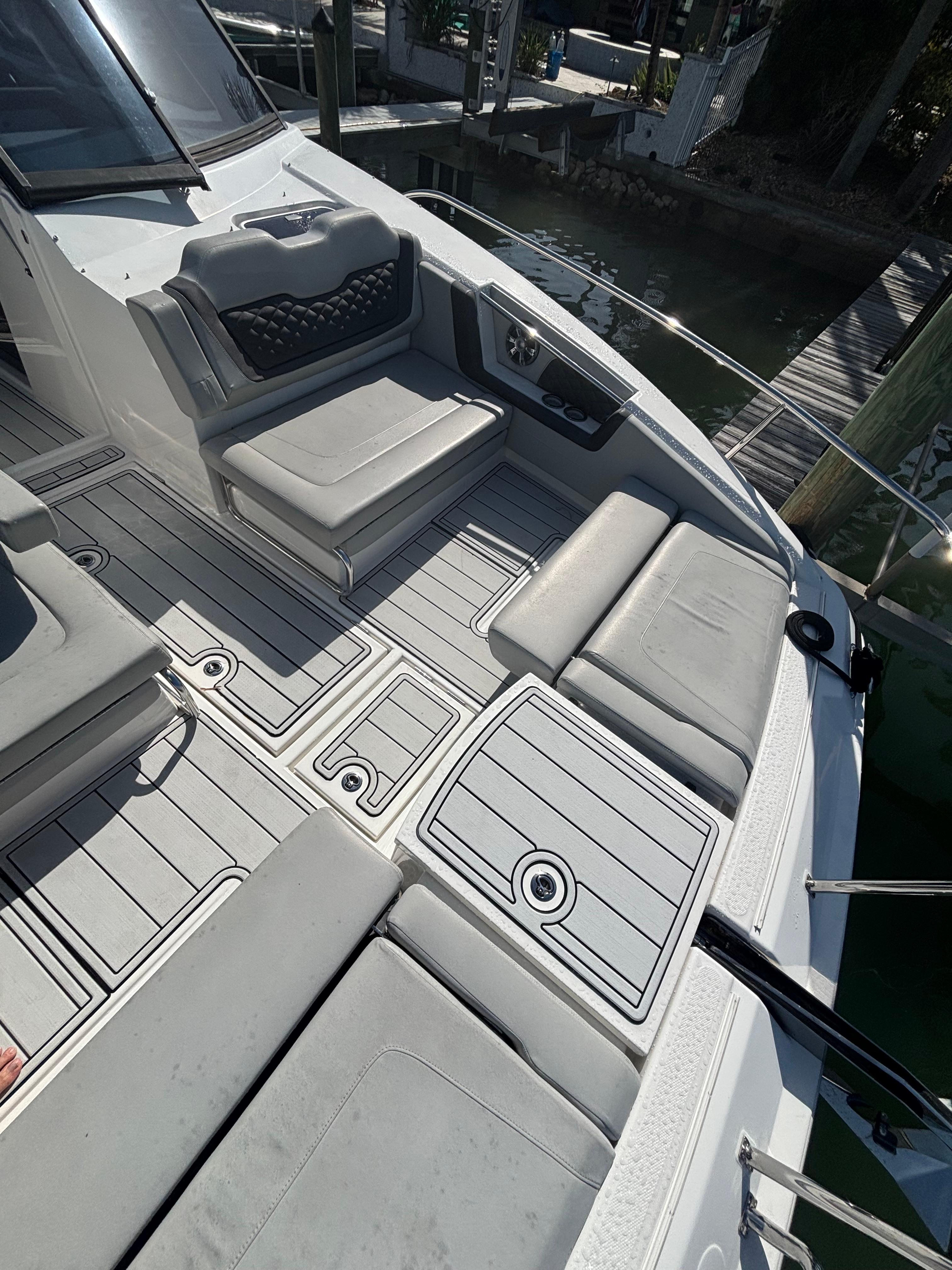 Aquila-36 Sport 2018-Namaste FL-US-Aquila 36 Sport 2018 boat deck with cushioned seating and sleek design.-9848040 | Thumbnail