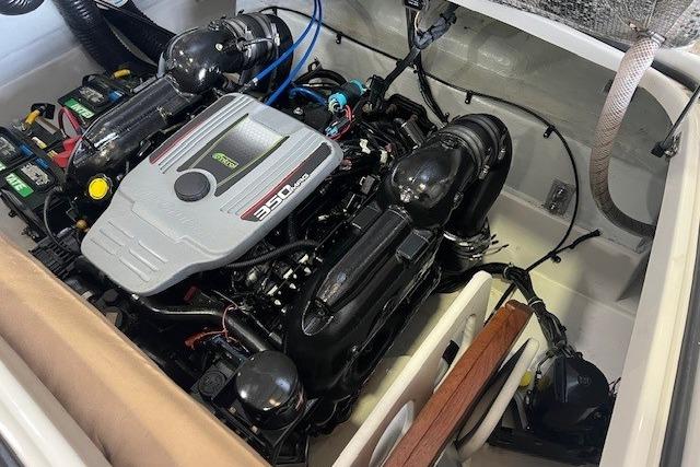 Engine compartment of a 2011 Chris-Craft Launch 22 boat, featuring a 350 MAG engine.