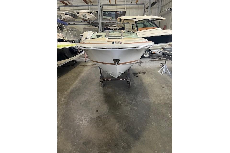 2011 Chris-Craft Launch 22 boat in storage, front view.