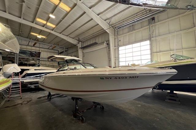 2011 Chris-Craft Launch 22 boat in a spacious indoor storage facility.