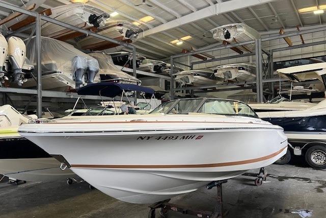 2011 Chris-Craft Launch 22 boat in indoor storage facility.