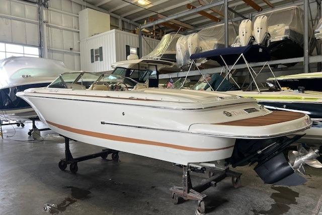 2011 Chris-Craft Launch 22 boat in indoor storage facility.