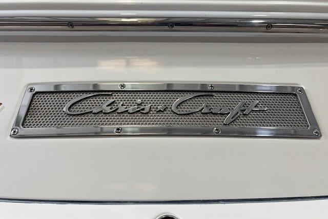 2011 Chris-Craft Launch 22 logo on a metallic nameplate.