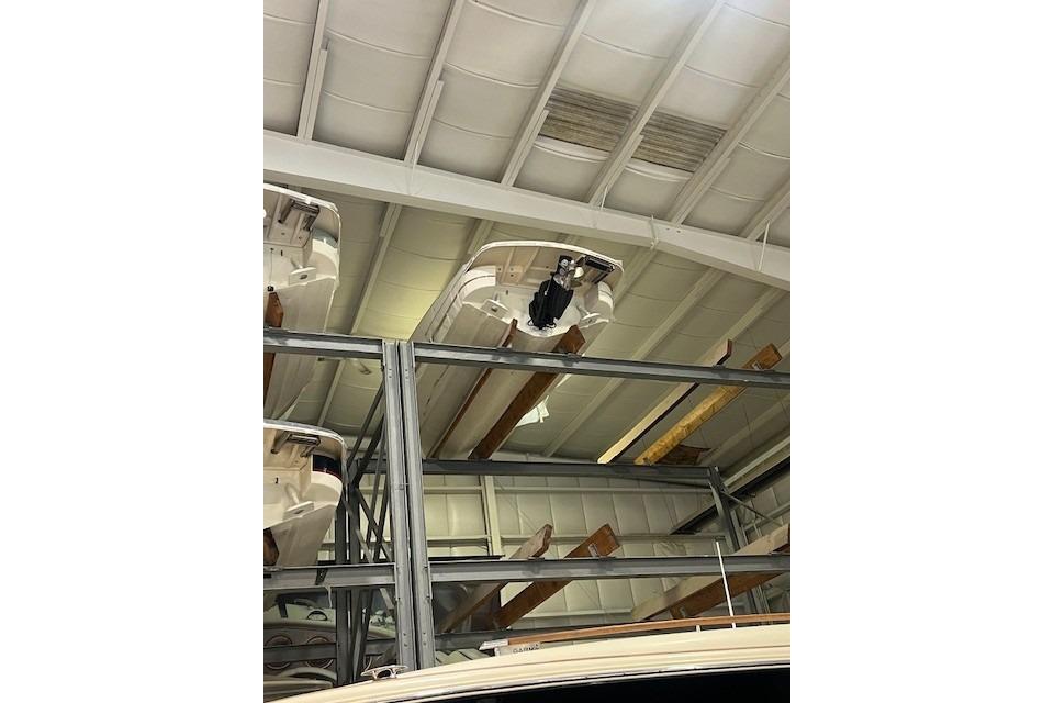 2011 Chris-Craft Launch 22 boats stored in a warehouse.