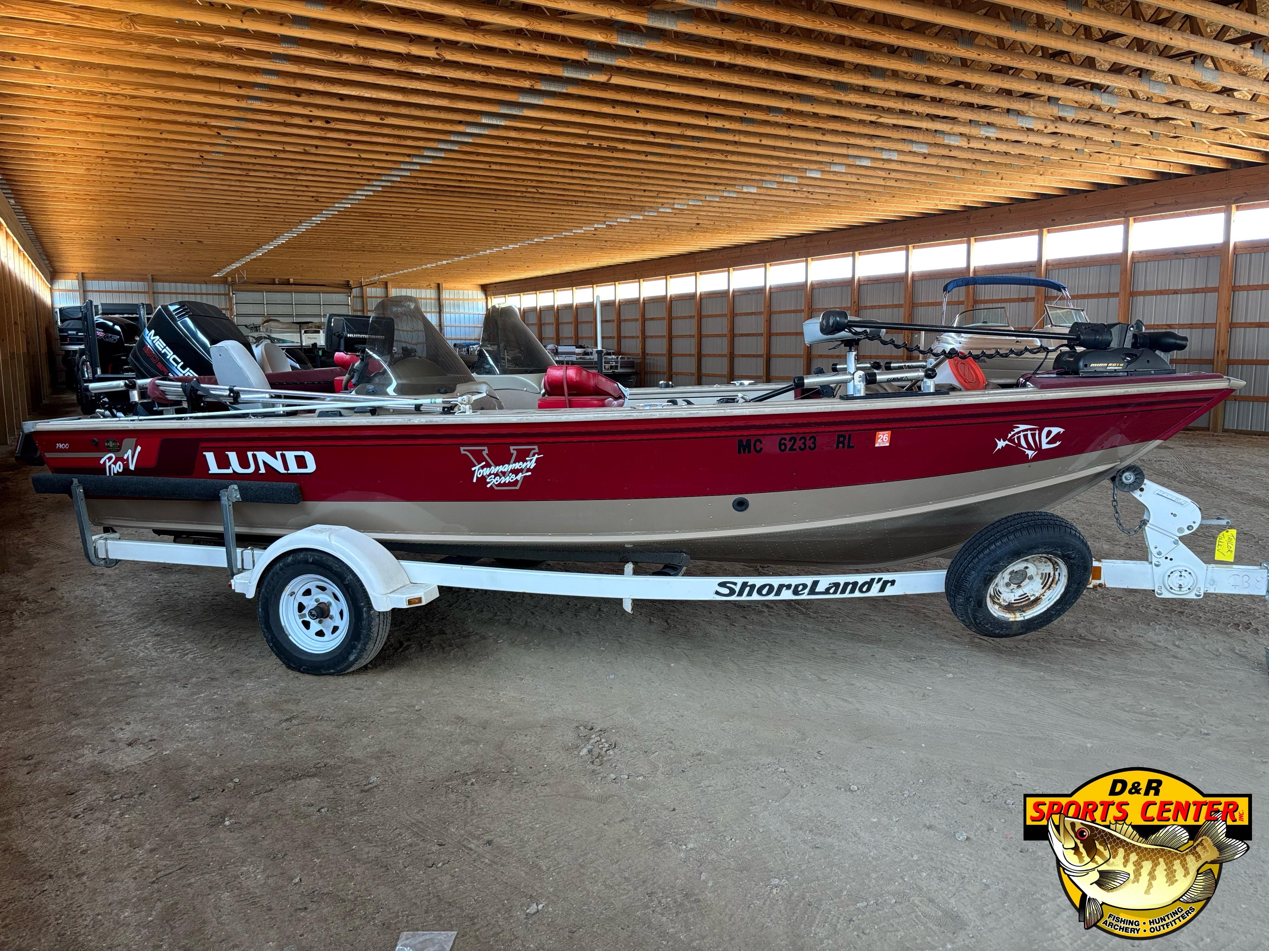1997 Lund 1900 Pro-V LE boat on ShoreLand'r trailer in storage facility.