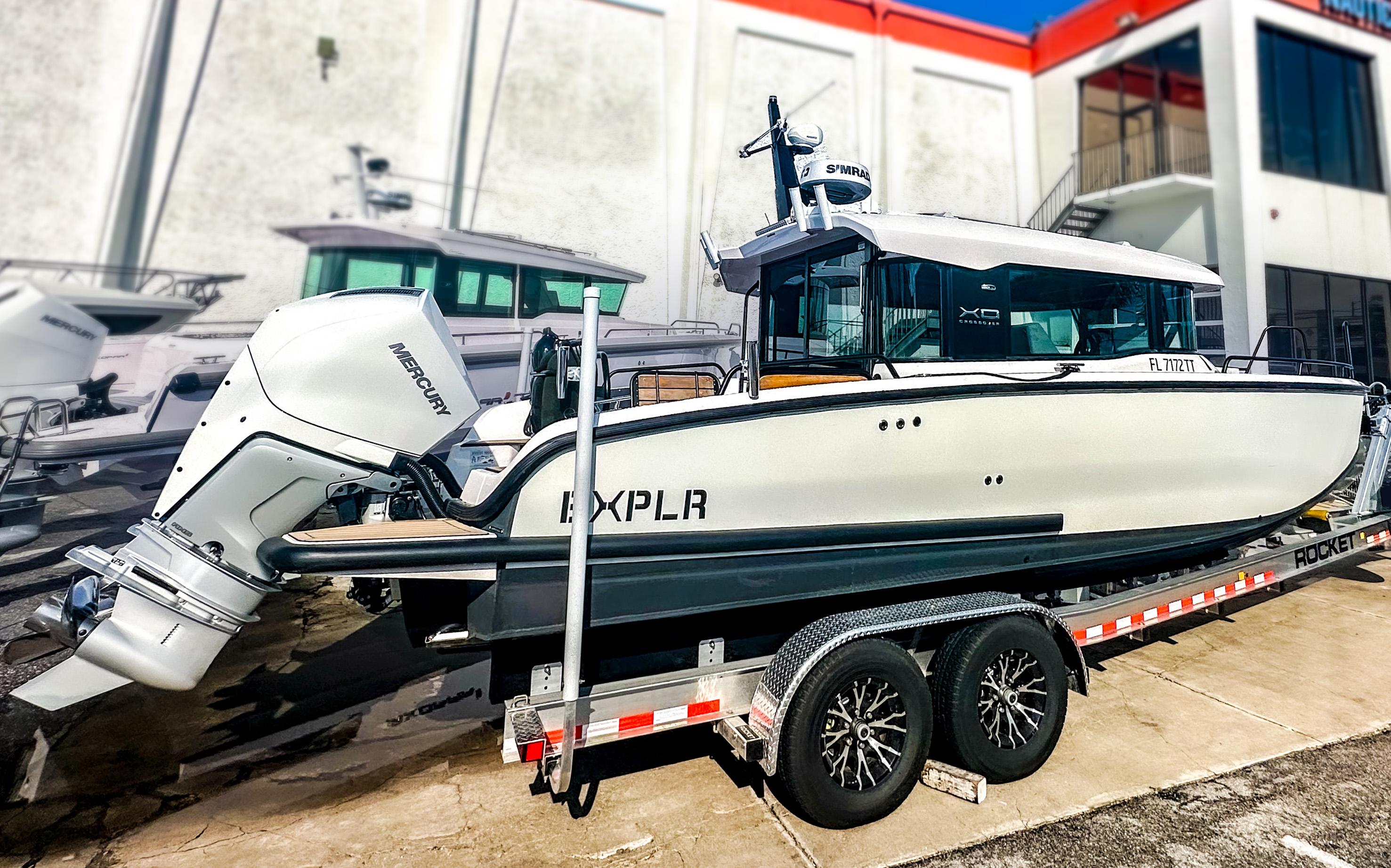 XO Boats-EXPLR 10 Sport Plus 2024 -FL-US-2024 XO Boats EXPLR 10 Sport Plus on trailer, showcasing sleek design and powerful engine.-9818089