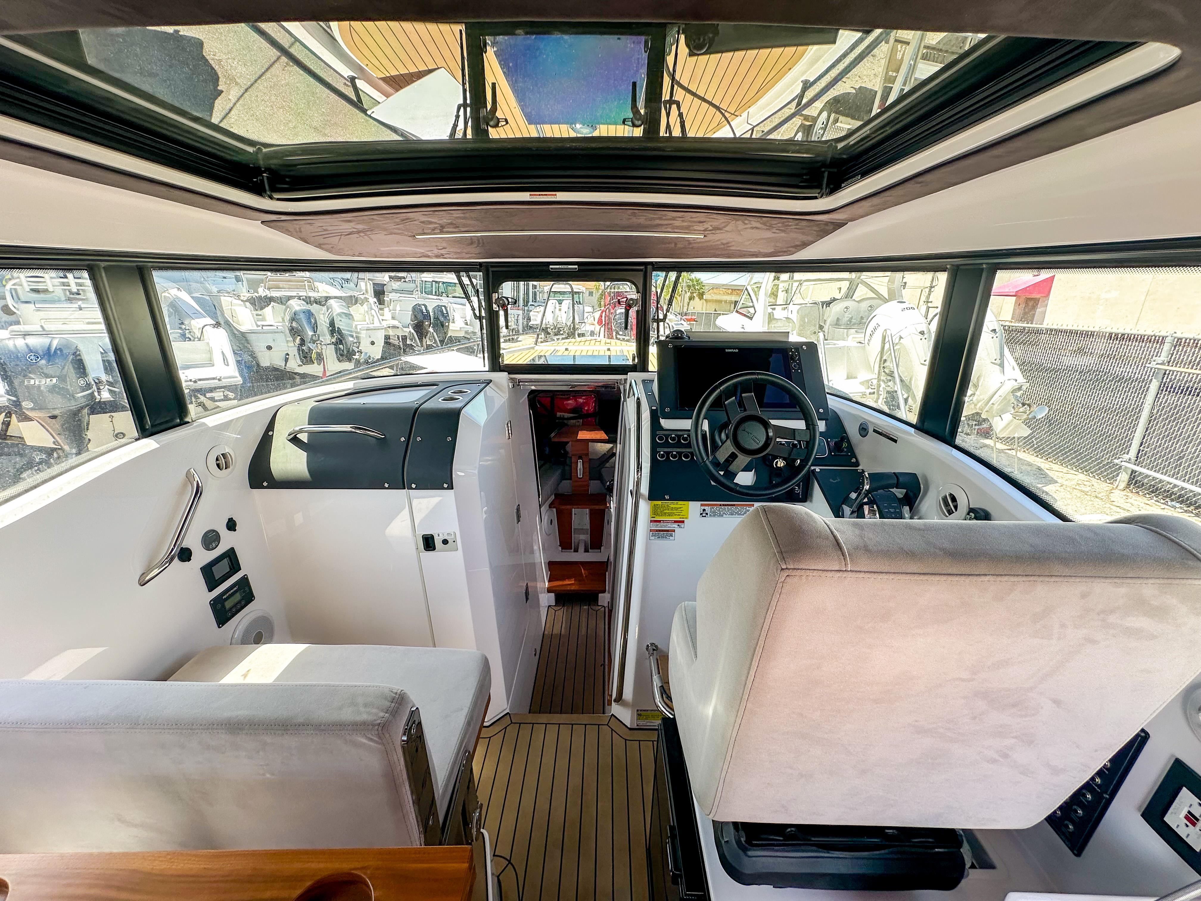 XO Boats-EXPLR 10 Sport Plus 2024 -FL-US-2024 XO Boats EXPLR 10 Sport Plus interior with modern helm and seating.-9818089 | Thumbnail
